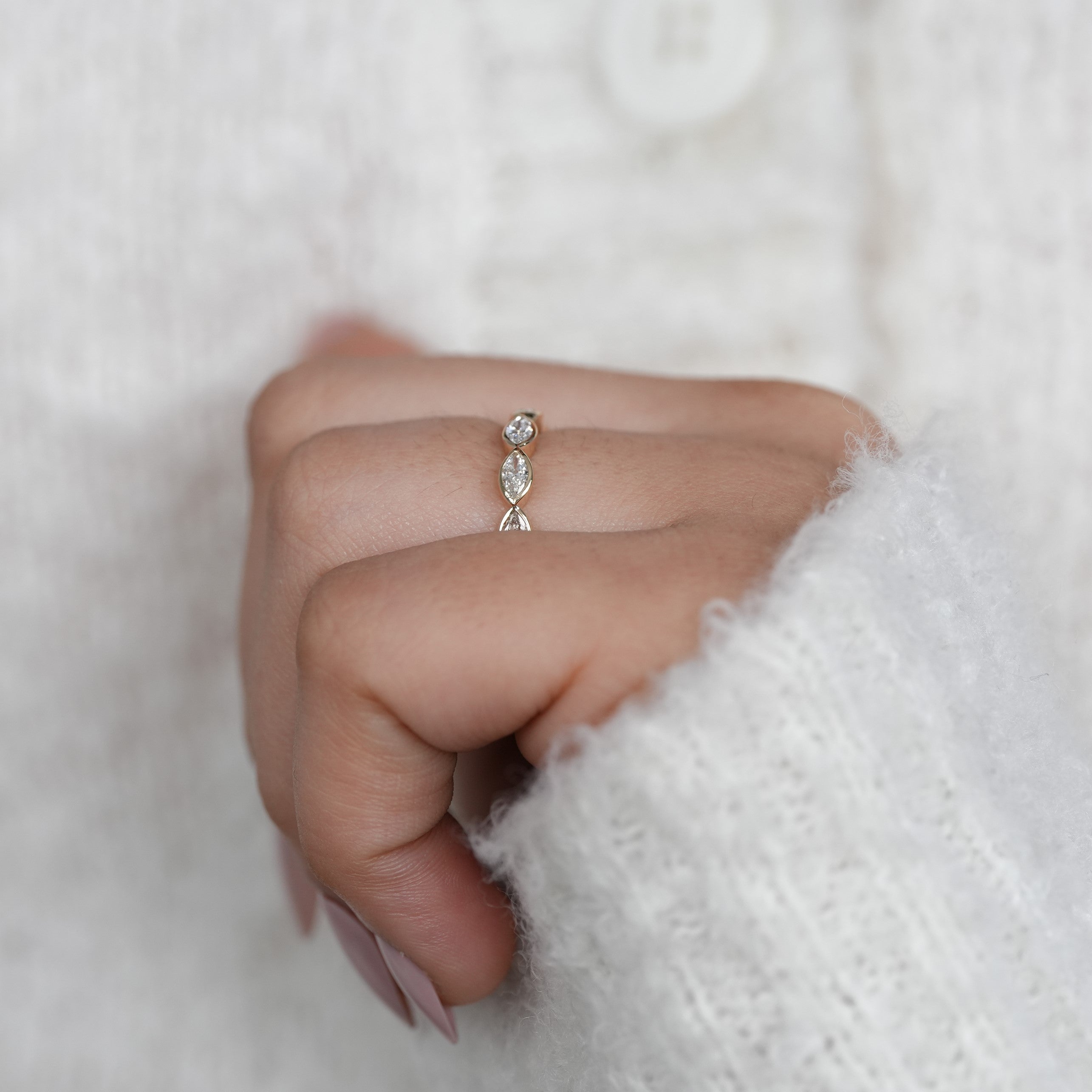Marquise bezel set eternity ring crafted with sparkling lab grown diamonds