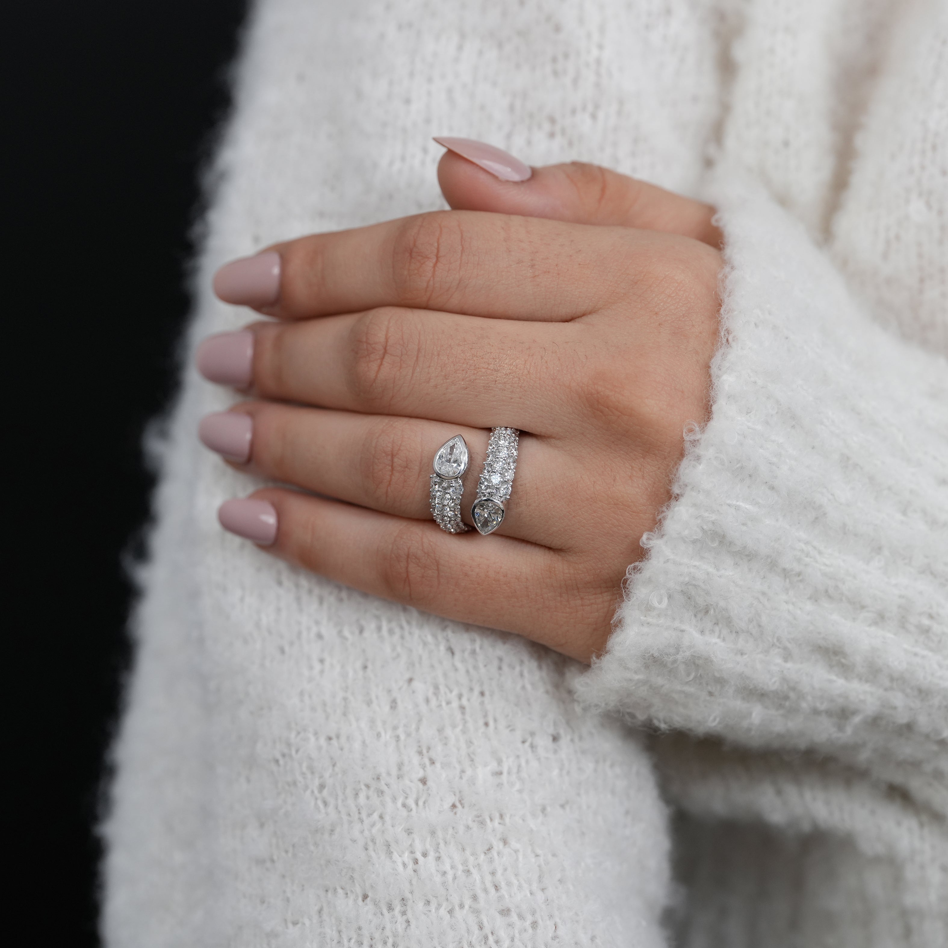 Sophisticated bypass ring showcasing lab grown diamonds with pear tips