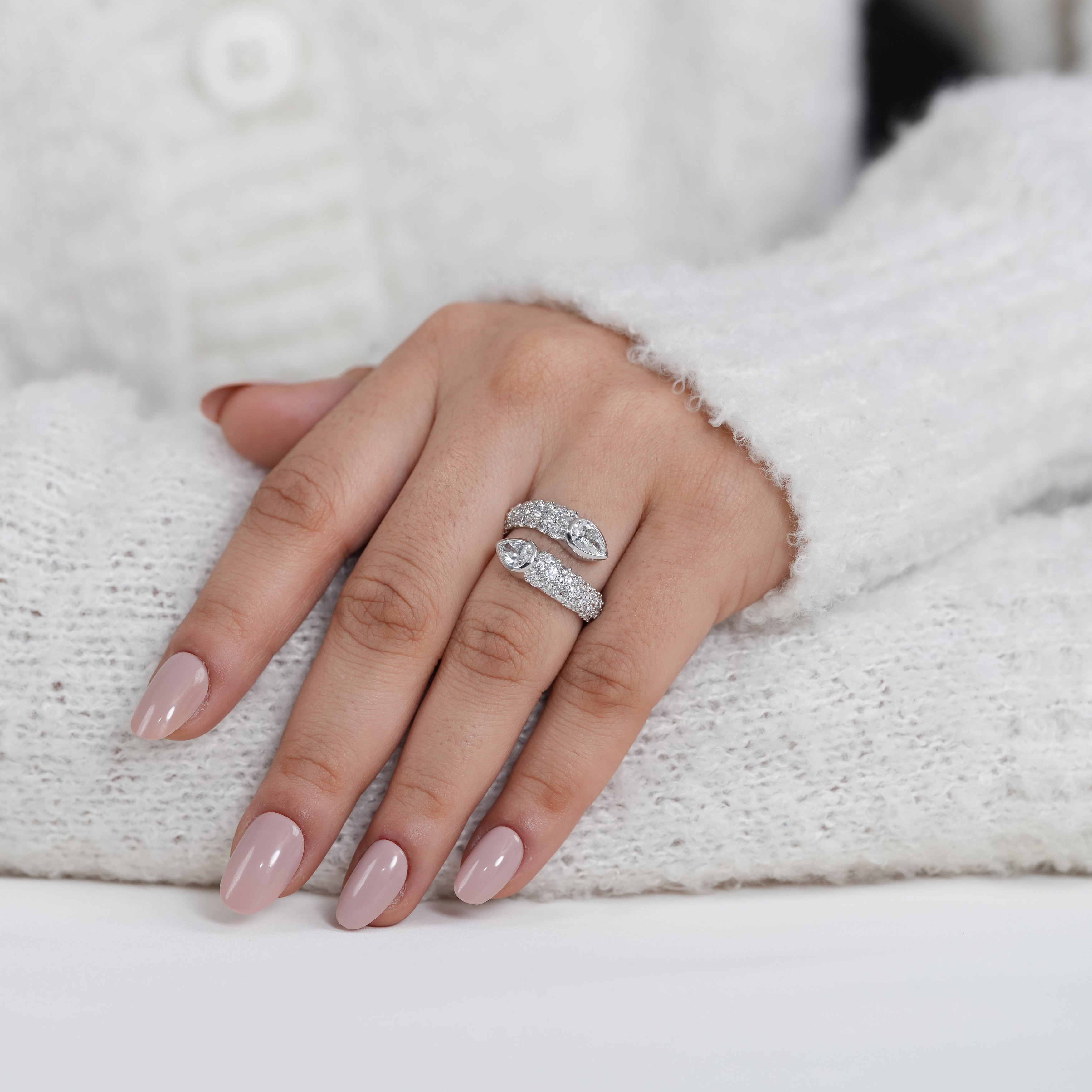 Open bypass diamond ring designed around pear lab grown diamond elegance