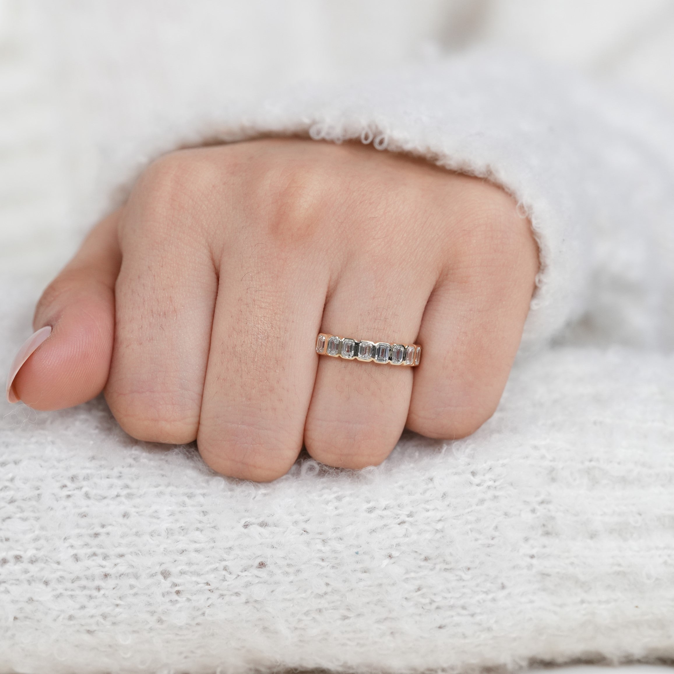 Bezel set emerald cut band featuring lab grown diamonds timeless wedding style