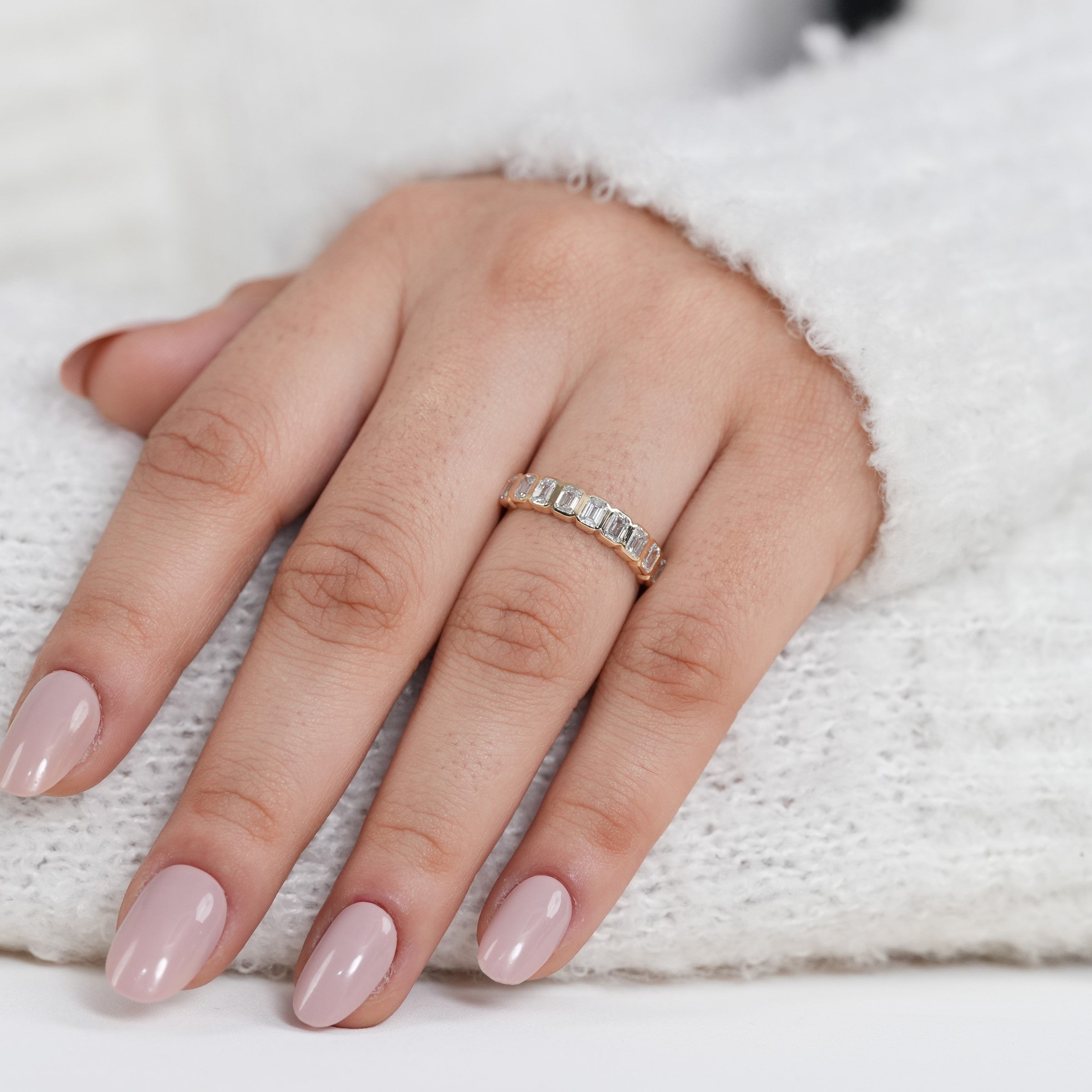 Elegant bezel set emerald cut band featuring lab grown diamonds perfect gift