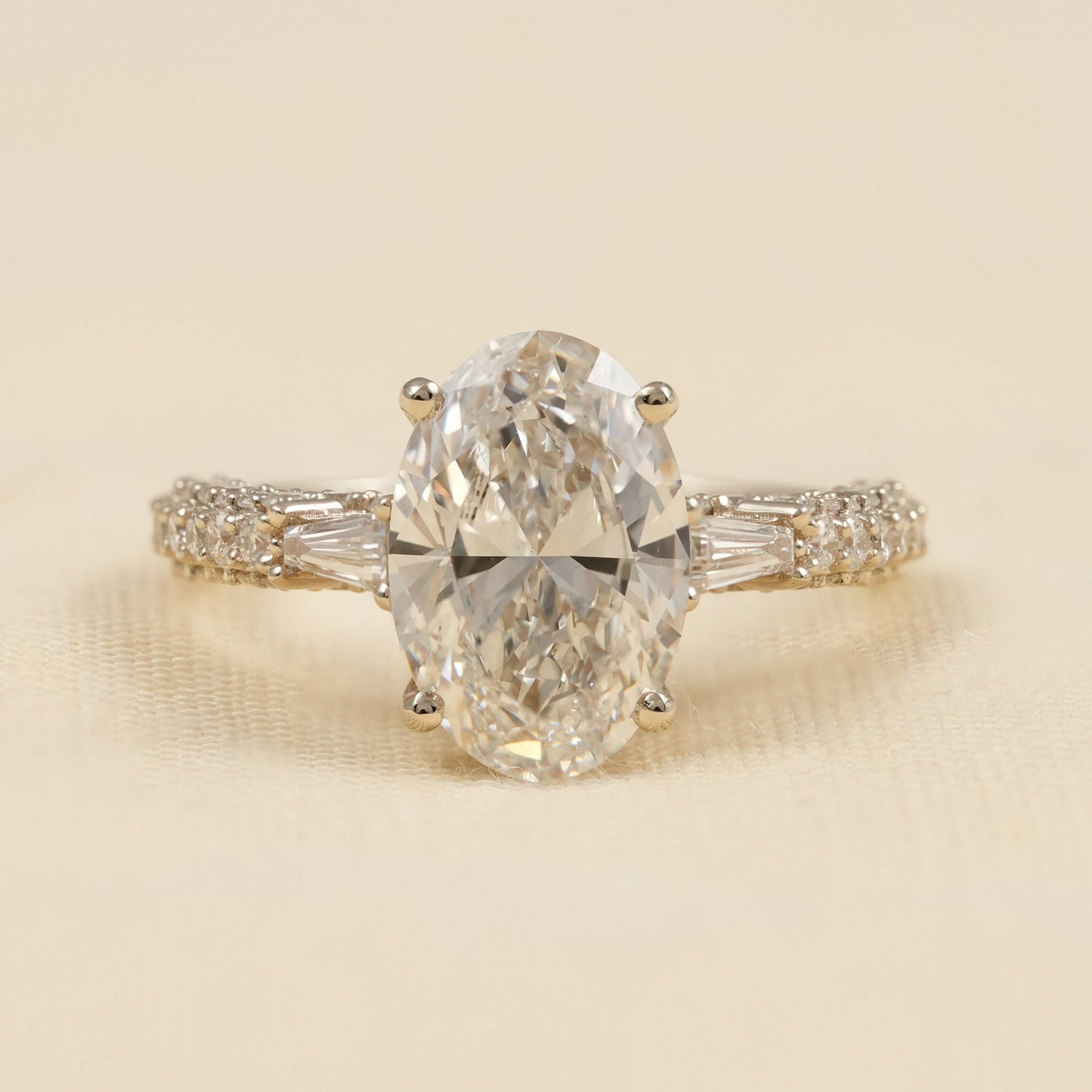 Oval Lab Diamond Engagement Ring with Tapered Baguette Side Stones