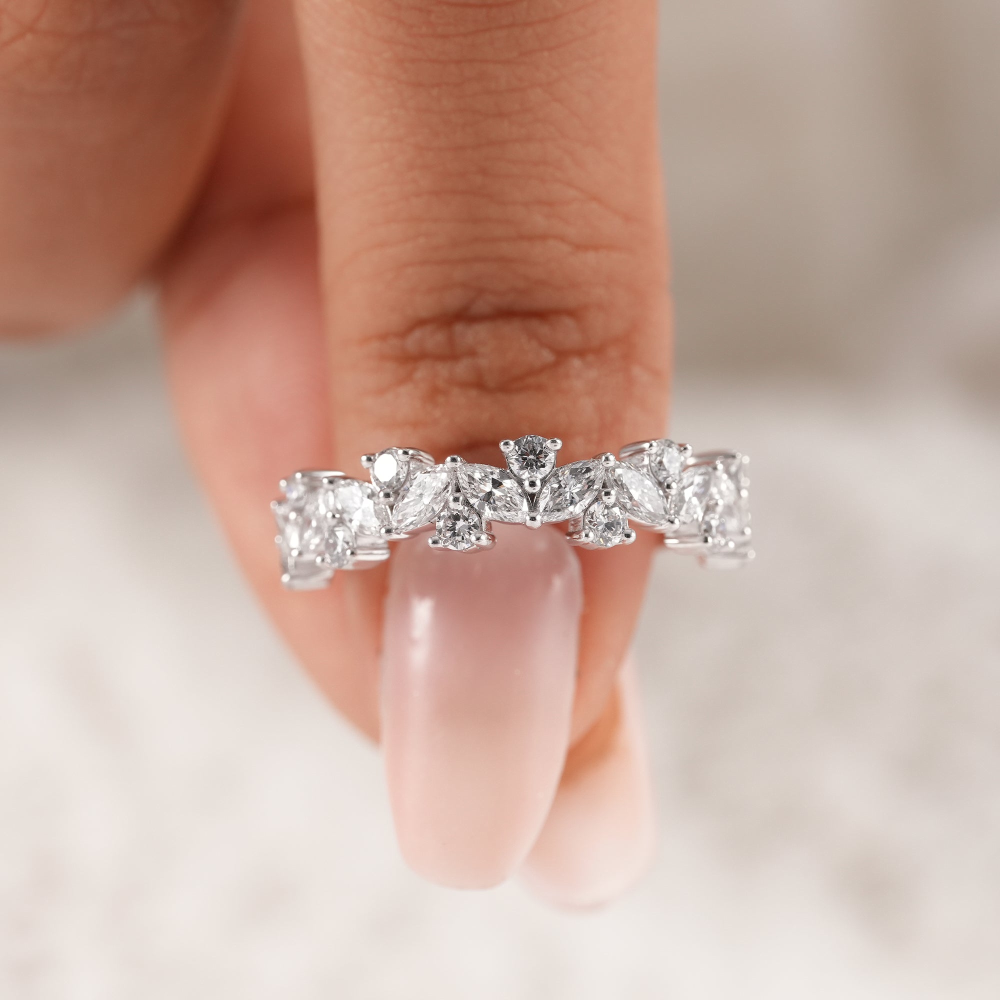 Luxury marquise and round diamond wedding ring for bridal jewelry.
