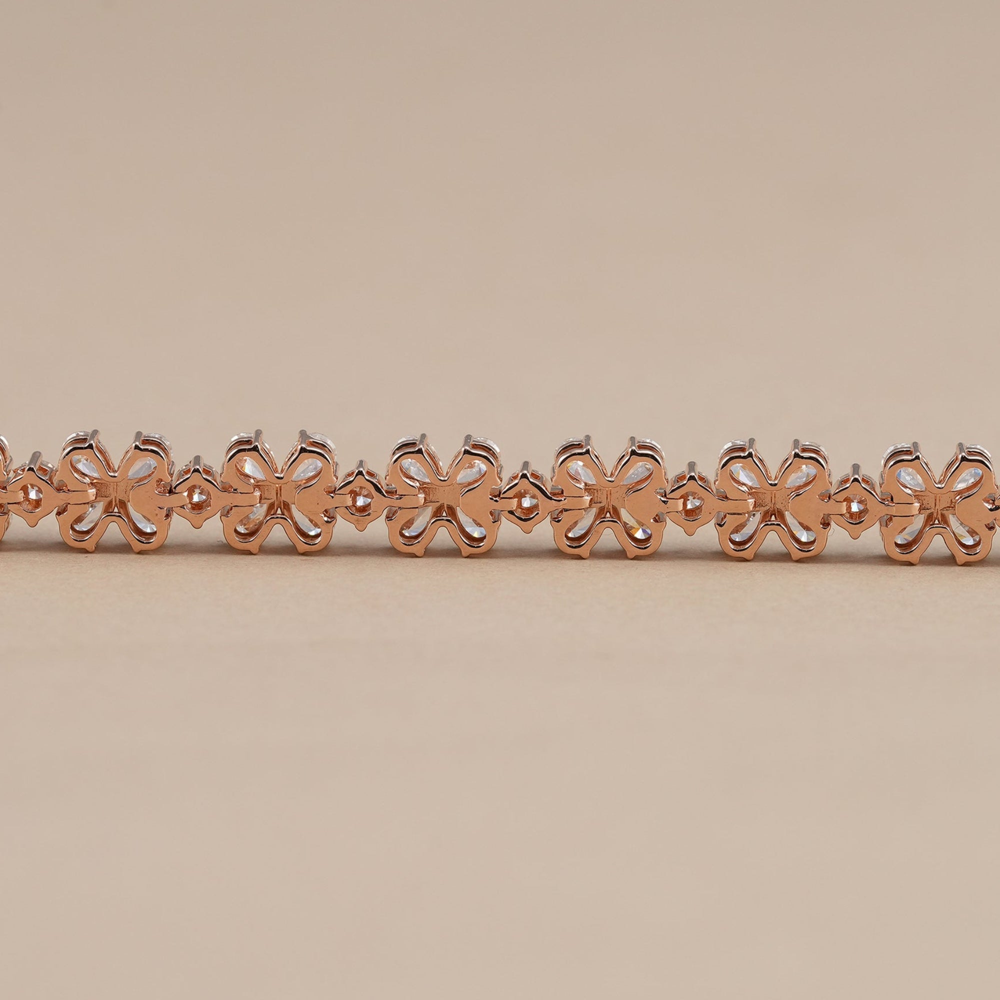 Rose gold floral lab grown diamond bracelet with pear shaped stones