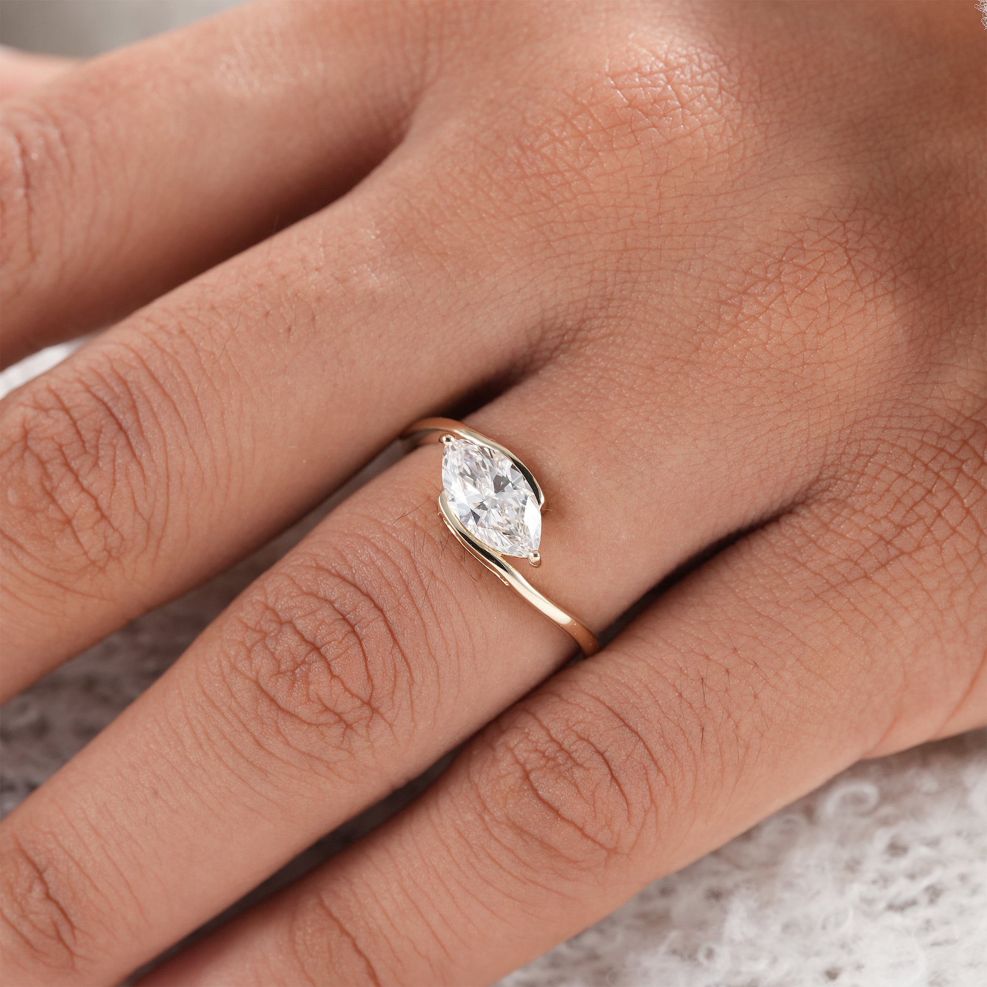 Sustainable lab grown marquise engagement ring.