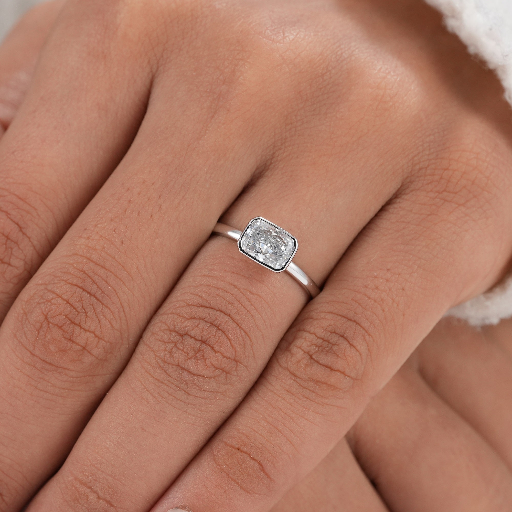 Handcrafted radiant diamond engagement ring with secure setting