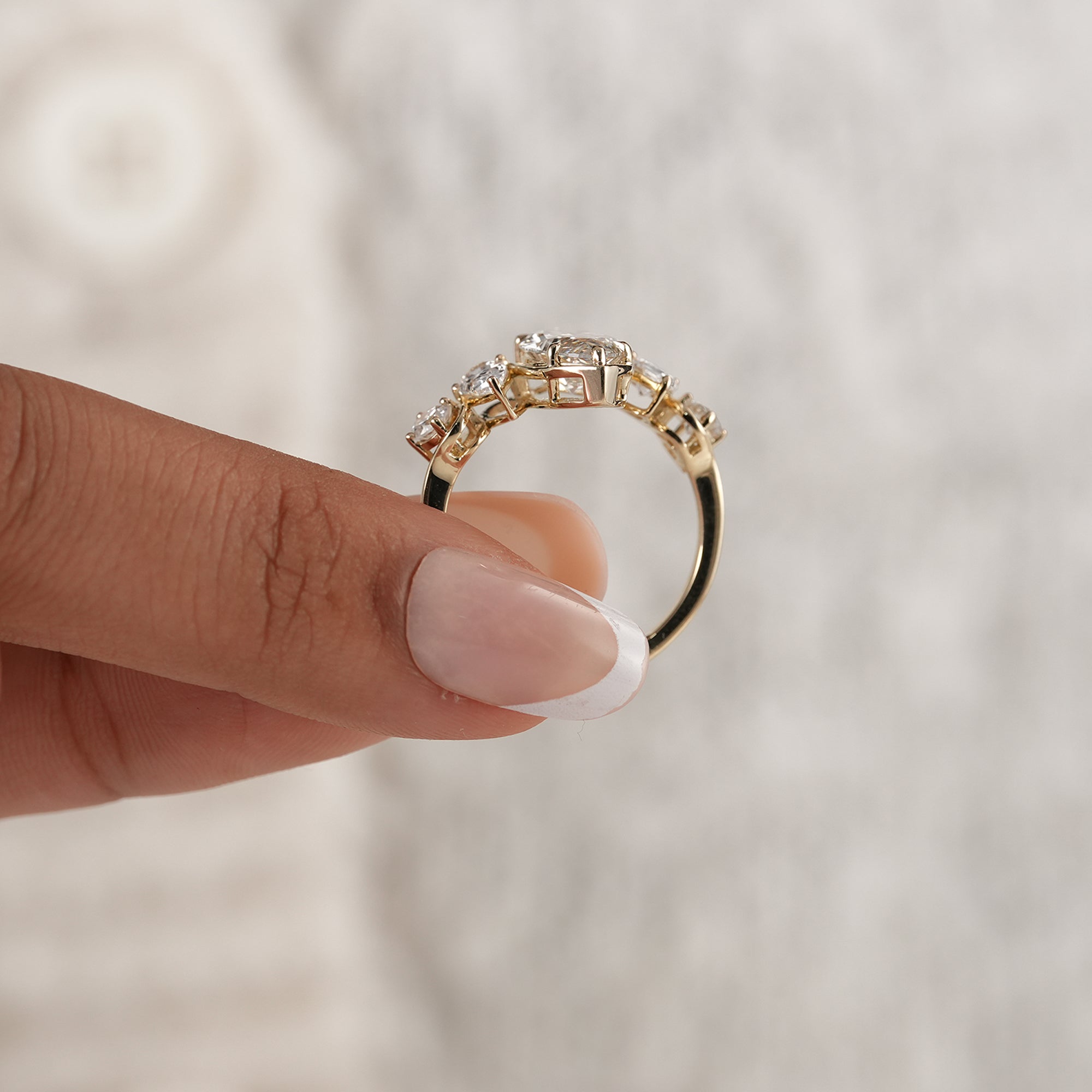 Fine jewelry marquise diamond ring with accent stones