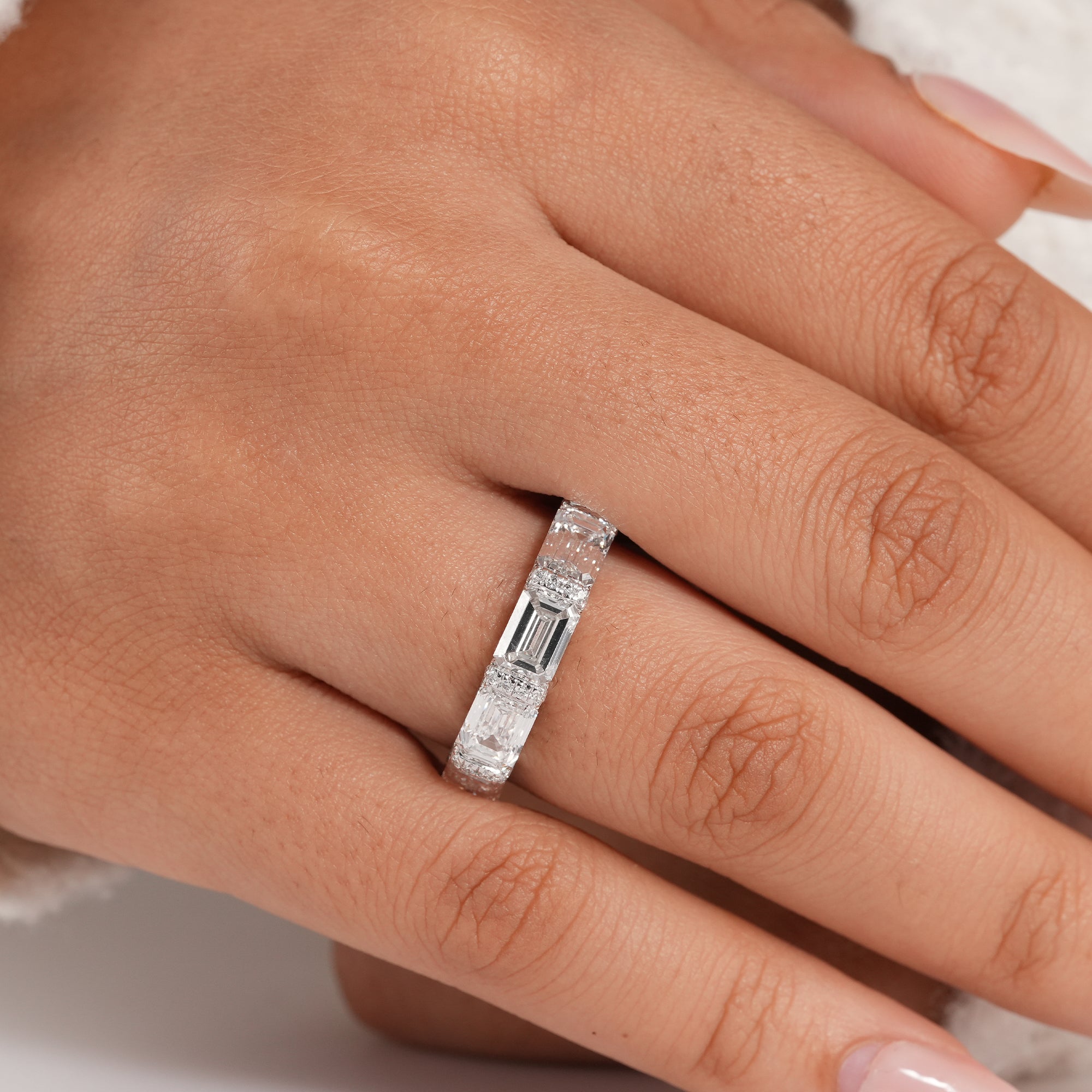 Fine jewelry emerald cut lab diamond ring.