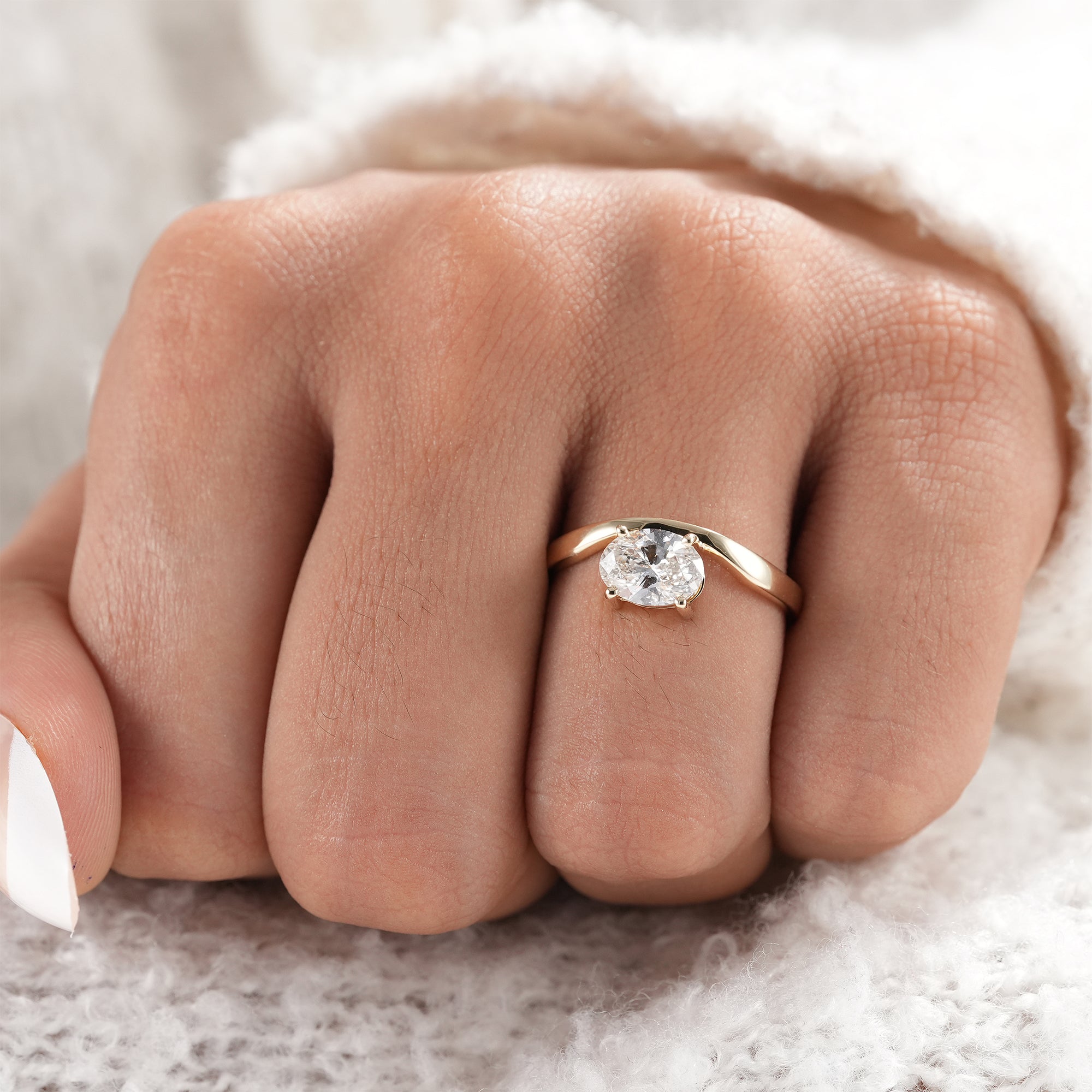 Luxury oval diamond solitaire engagement ring.