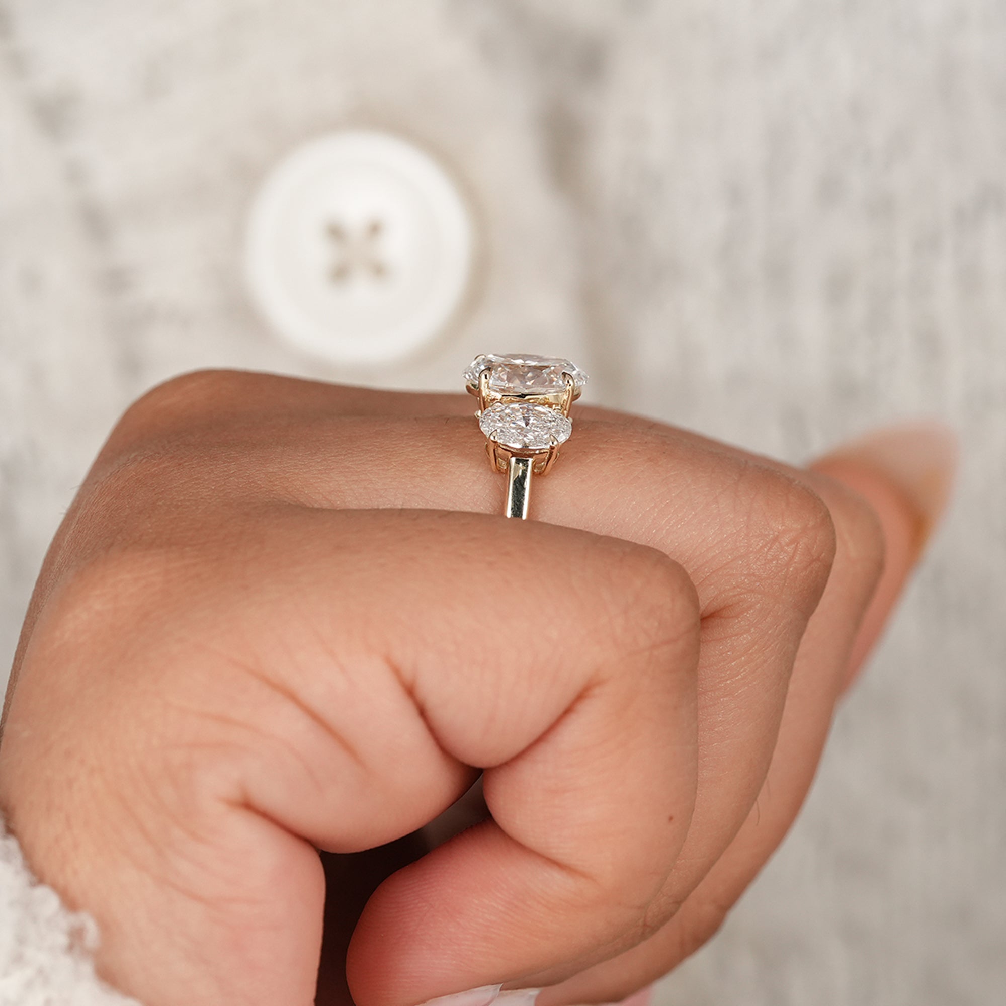 Sustainable oval three stone diamond ring with lab grown diamonds