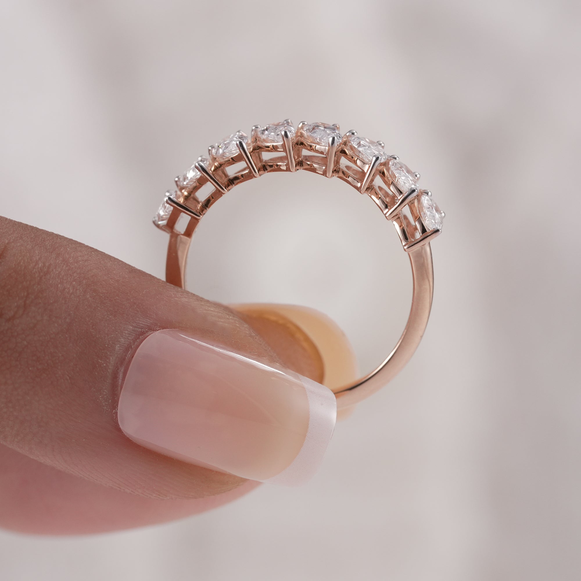 Pear shaped diamond wedding band for brides