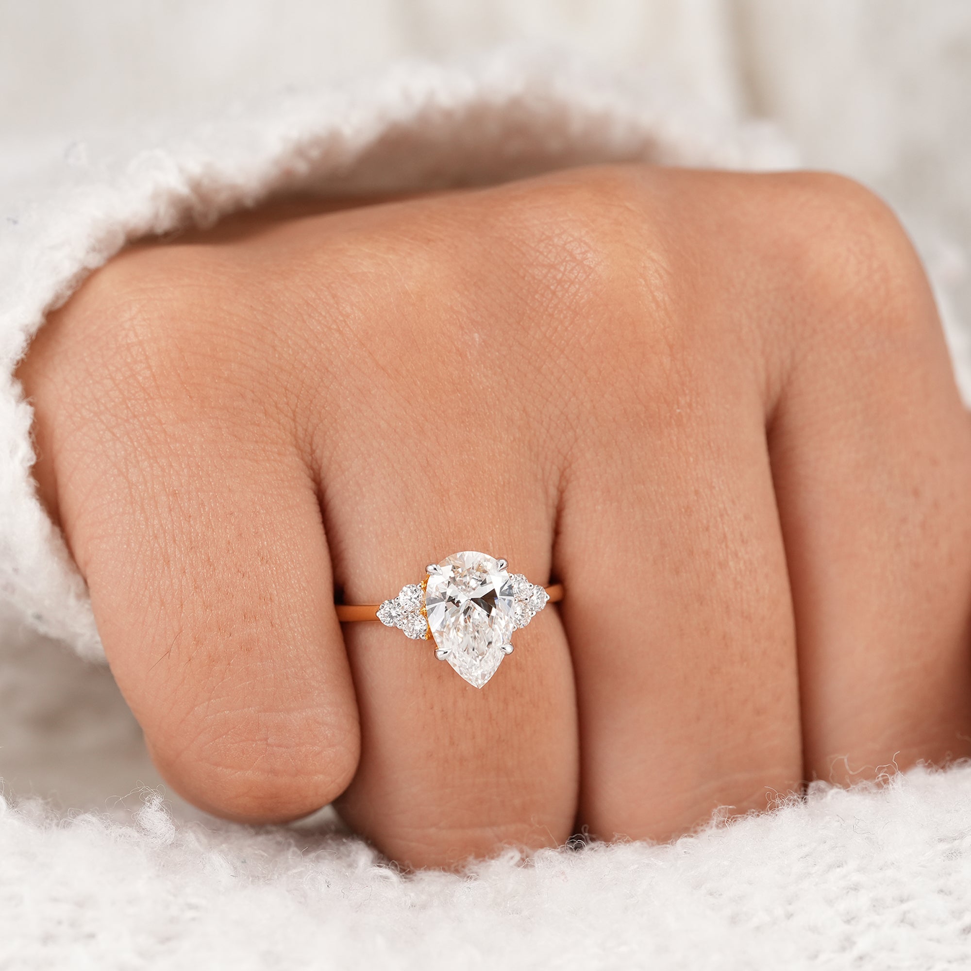 Fine jewelry pear diamond cluster ring in yellow gold