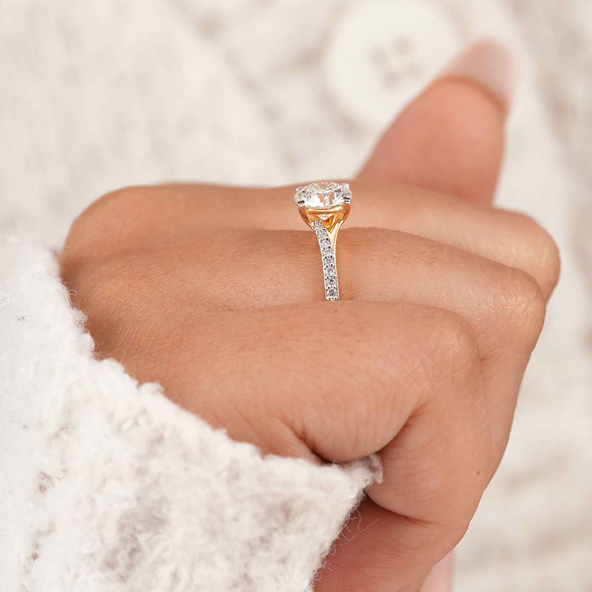 Timeless round lab grown diamond engagement ring with four prong setting
