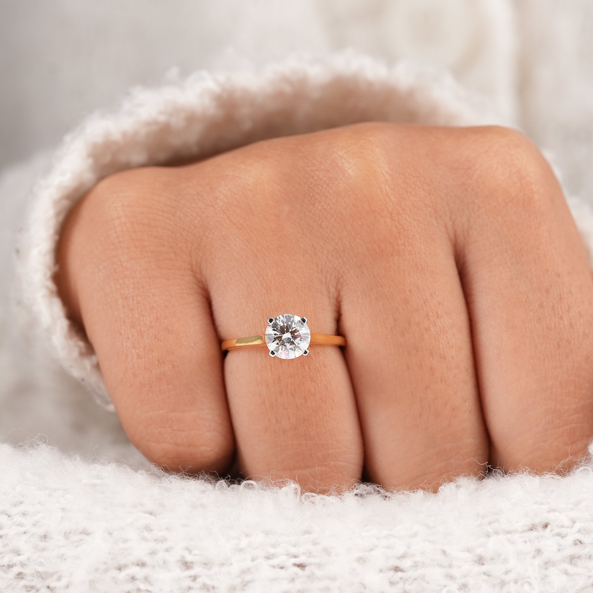Elegant cathedral solitaire ring with IGI certified round lab diamond