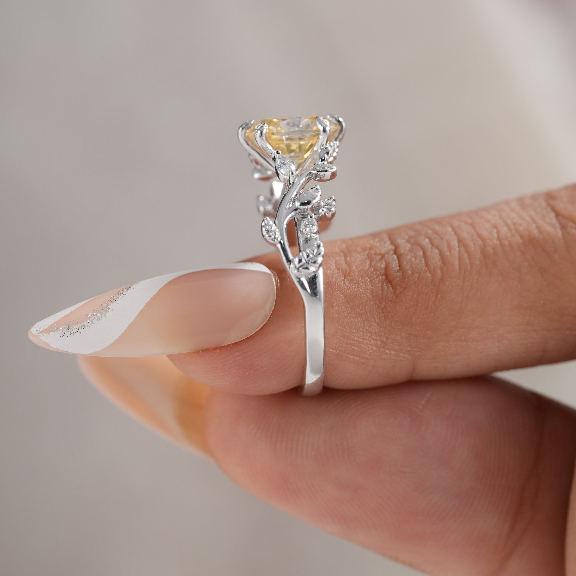 Floral vine engagement ring with lab grown diamonds.