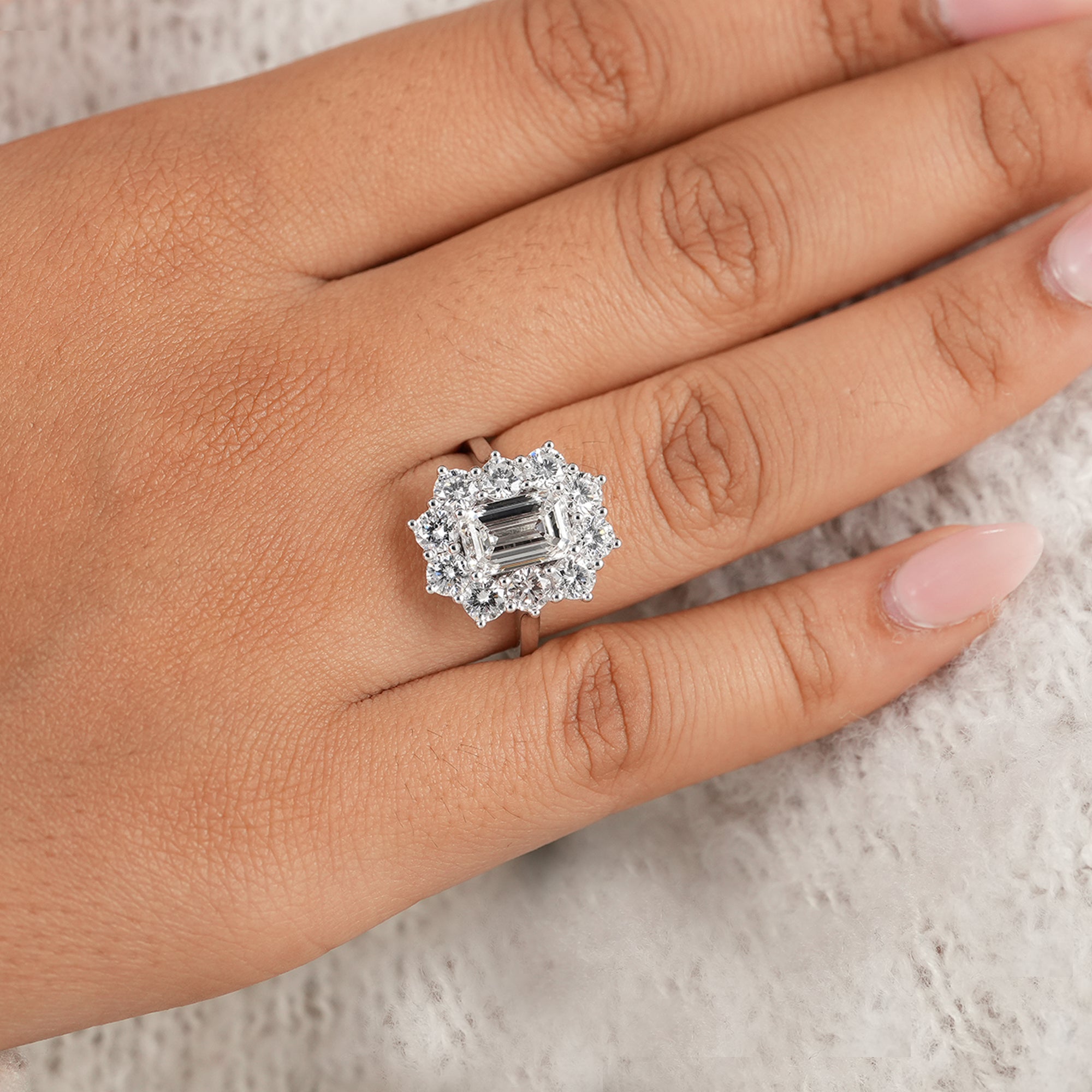 Elegant emerald halo diamond ring handcrafted in solid gold