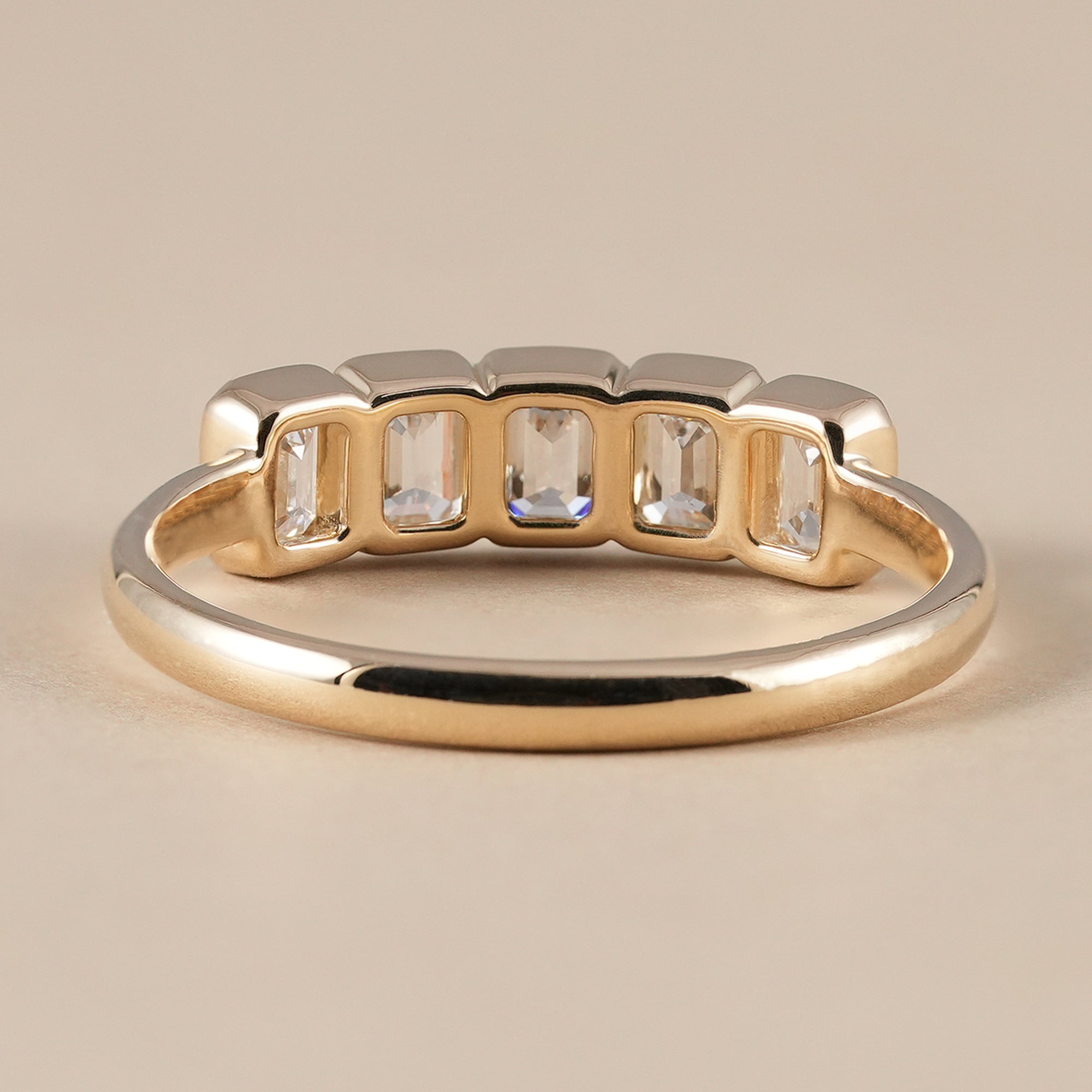 Elegant five stone emerald diamond anniversary ring