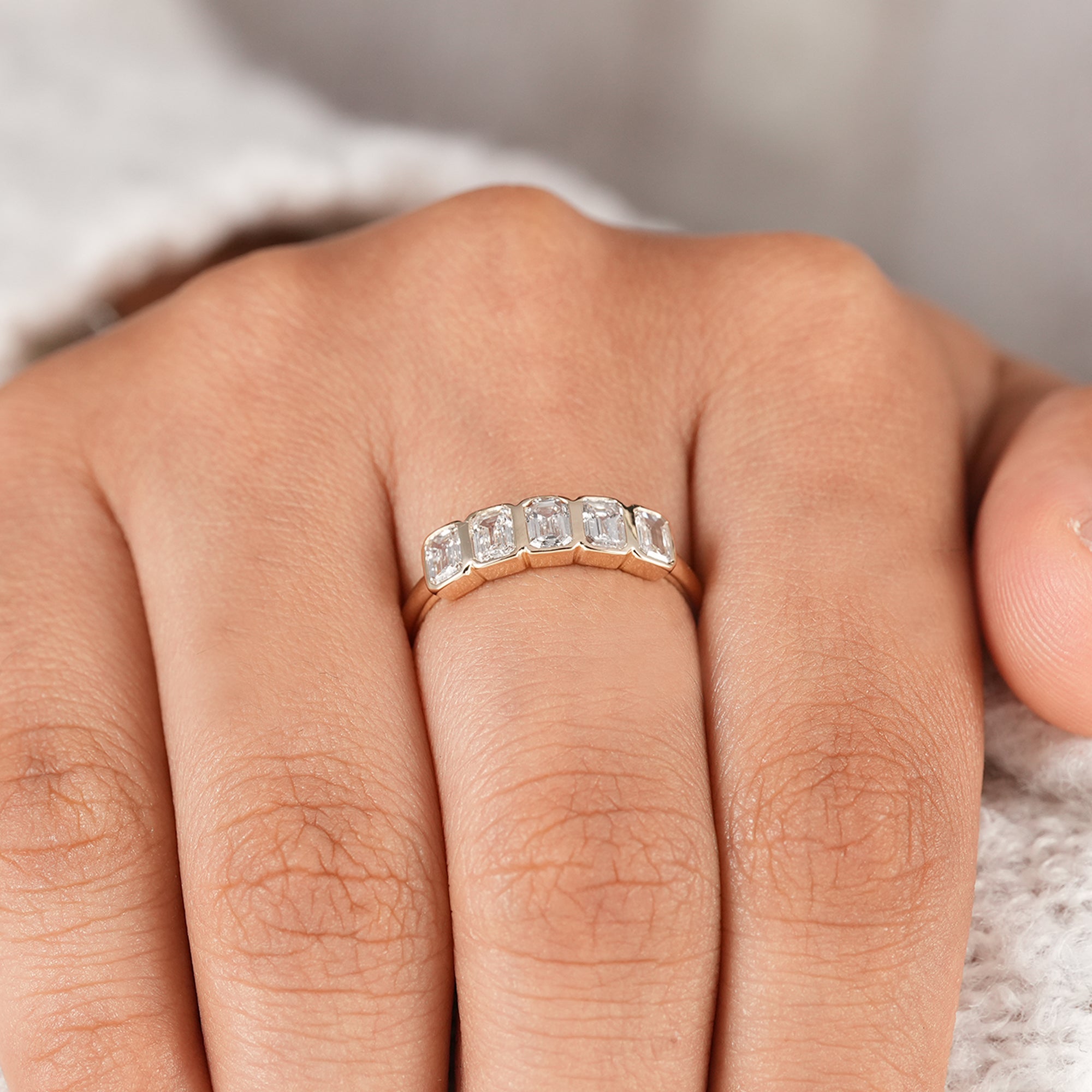 Emerald diamond stacking ring with five lab grown diamonds