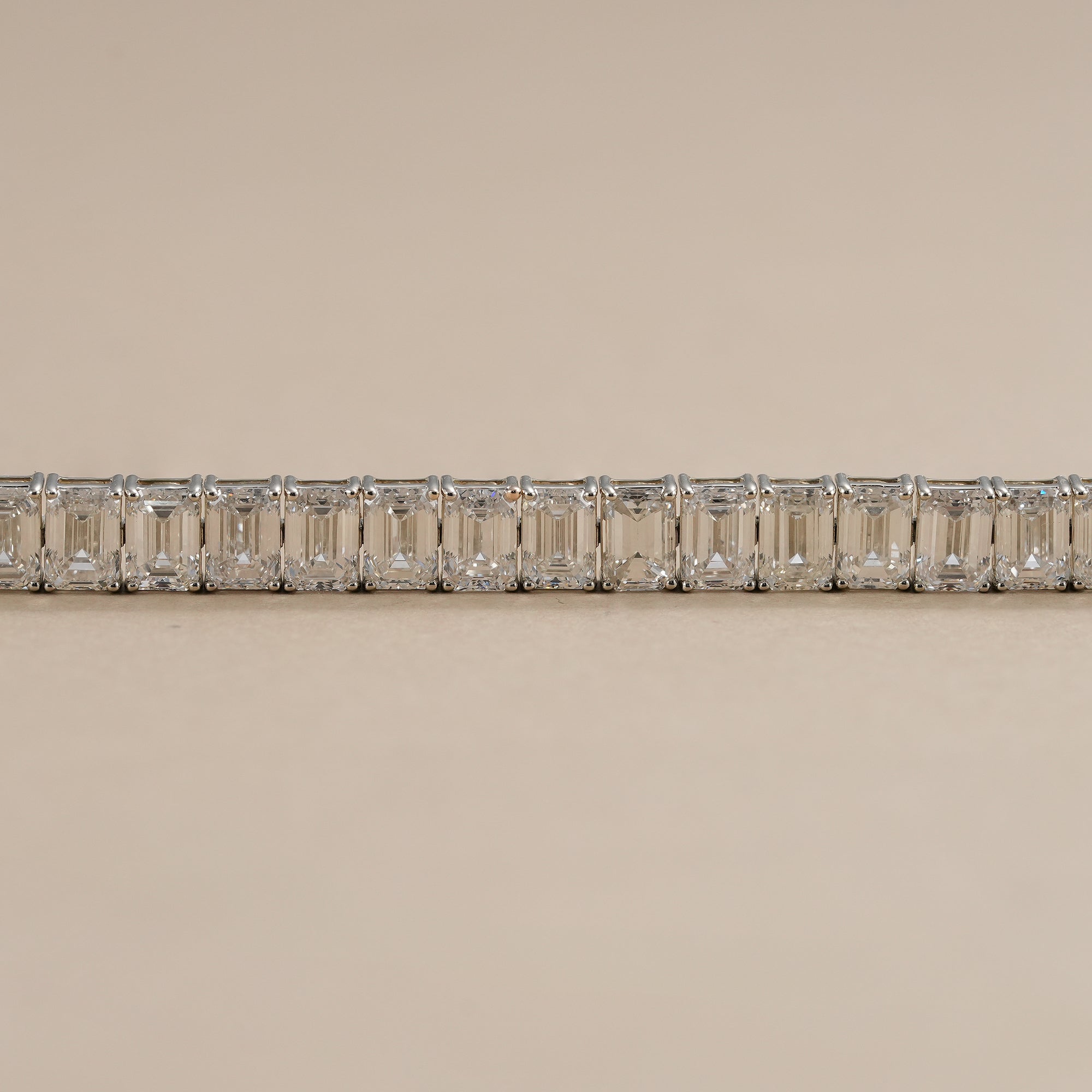 Luxury emerald-cut lab grown diamond bracelet in white gold.