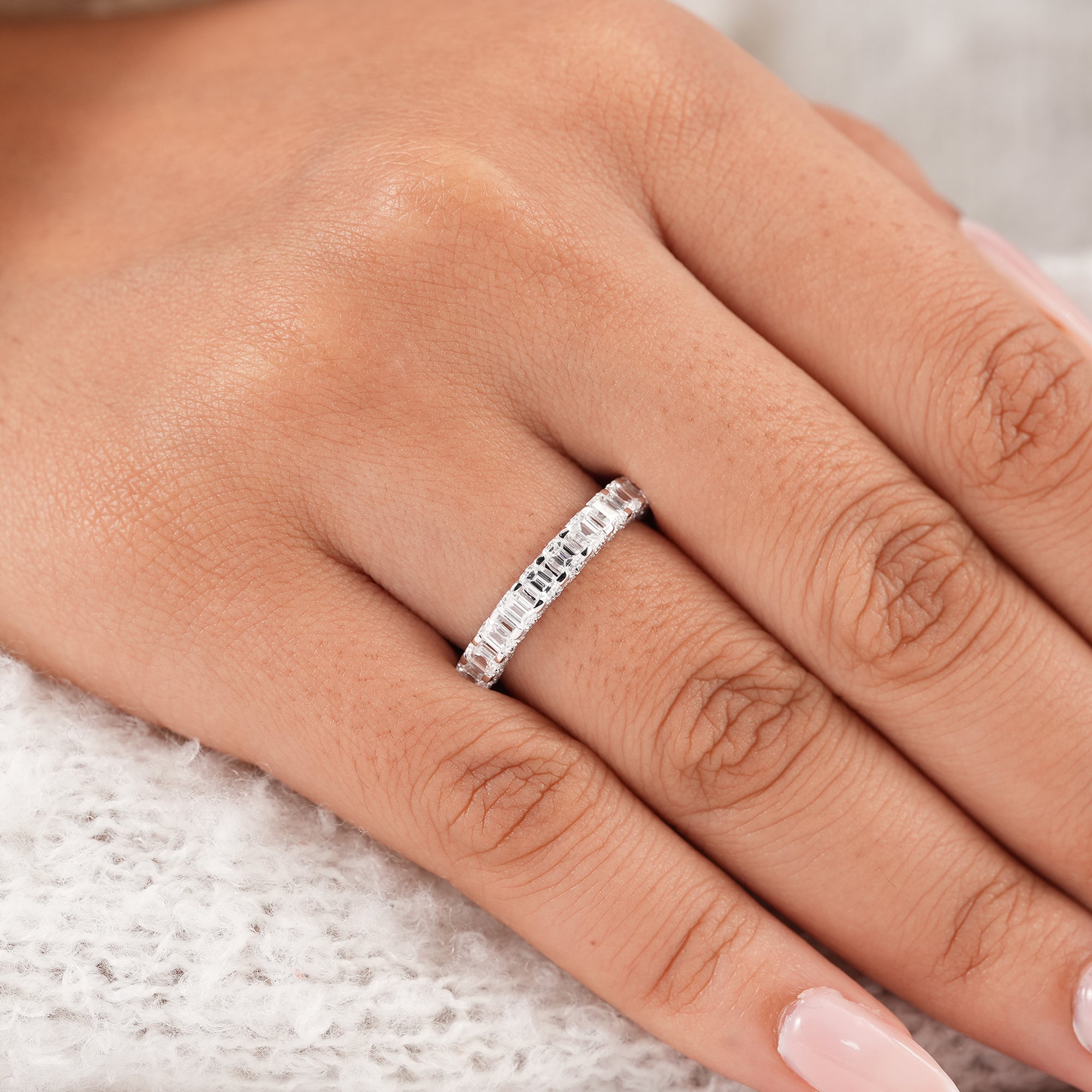 Elegant emerald diamond stacking ring with shared prong setting