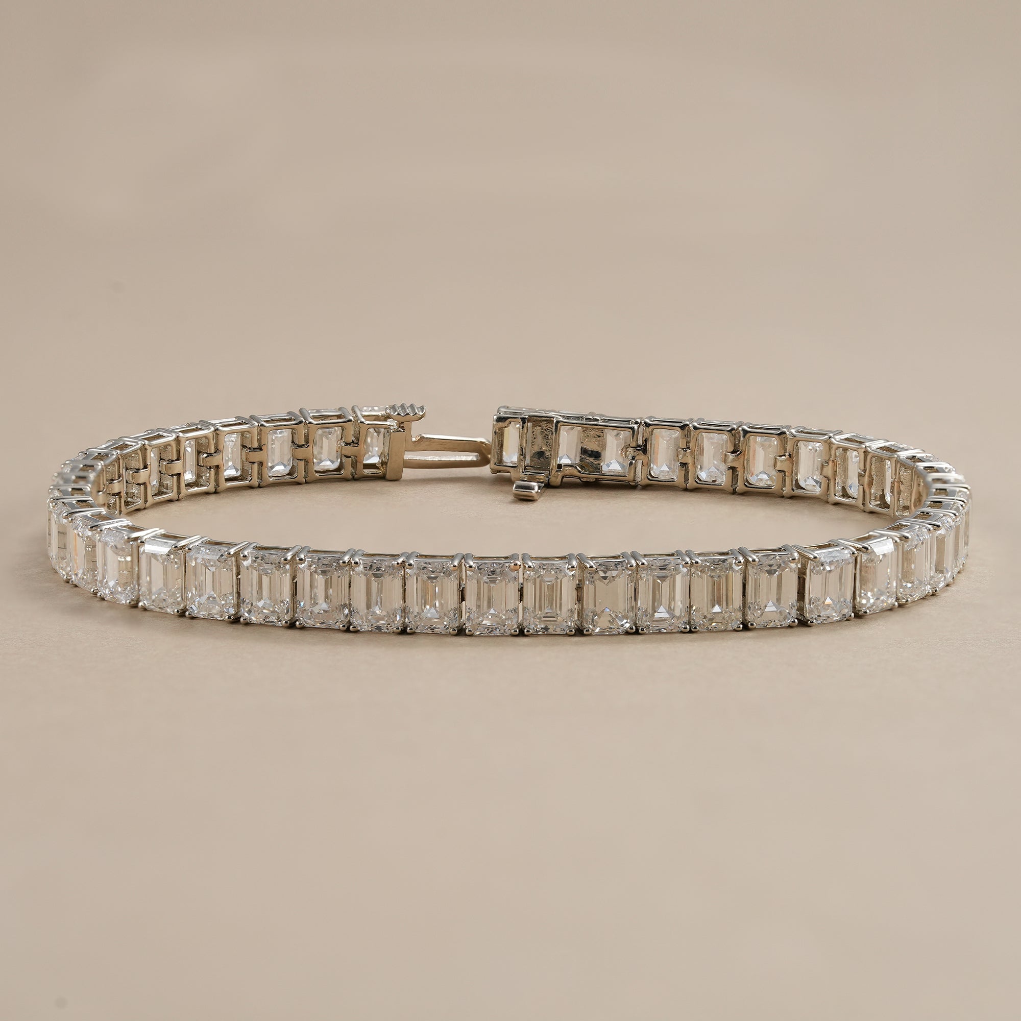Classic emerald-cut tennis bracelet featuring lab grown diamonds.