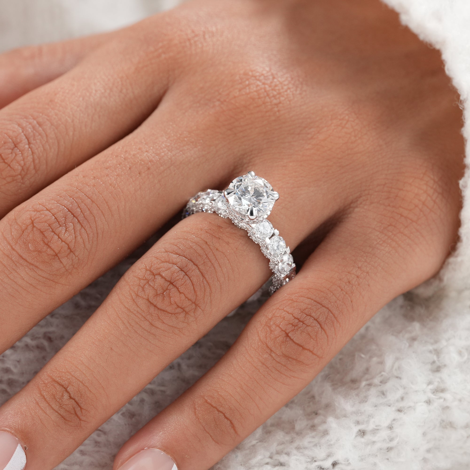 Fine jewelry round hidden halo engagement ring.