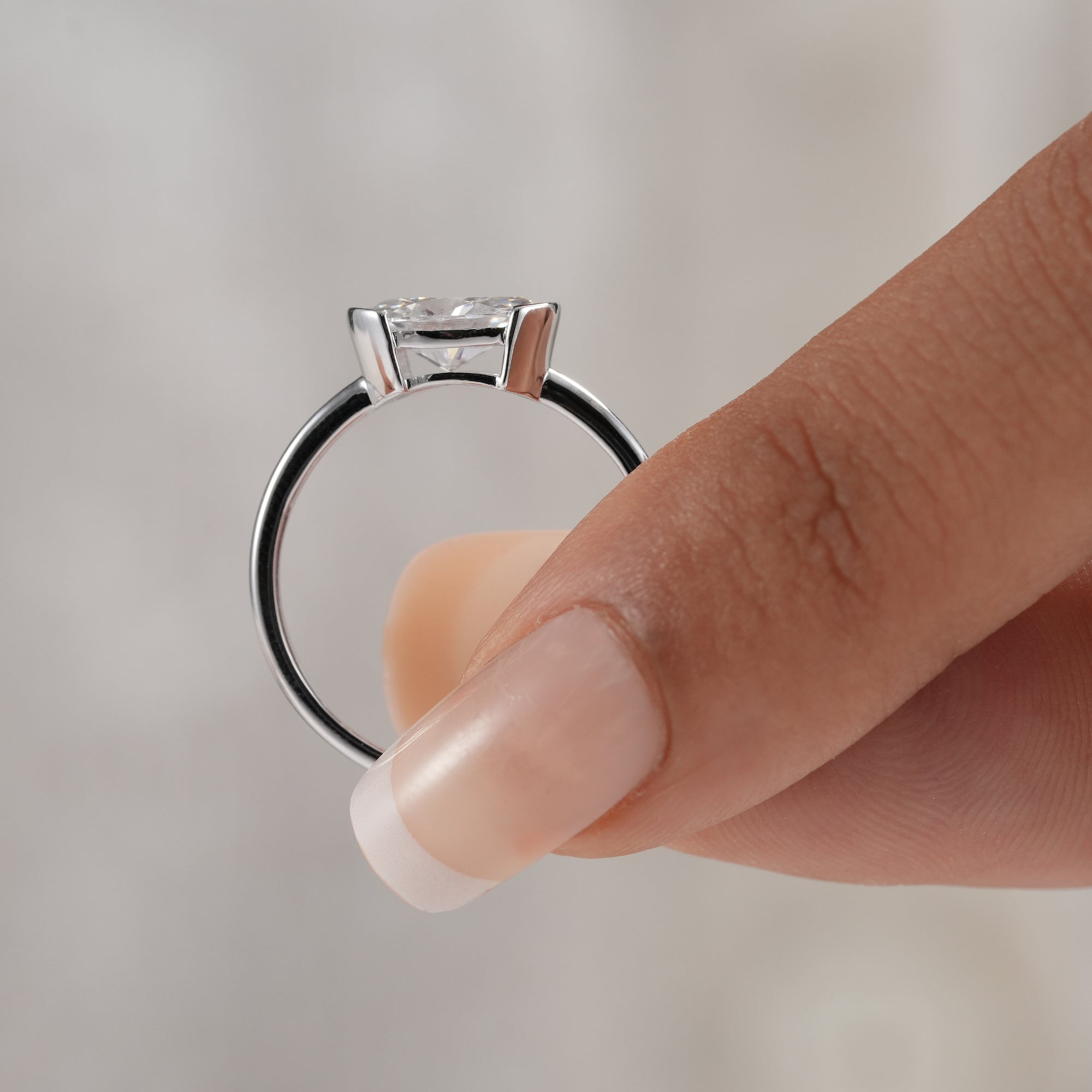 Elegant oval lab grown diamond ring with polished band