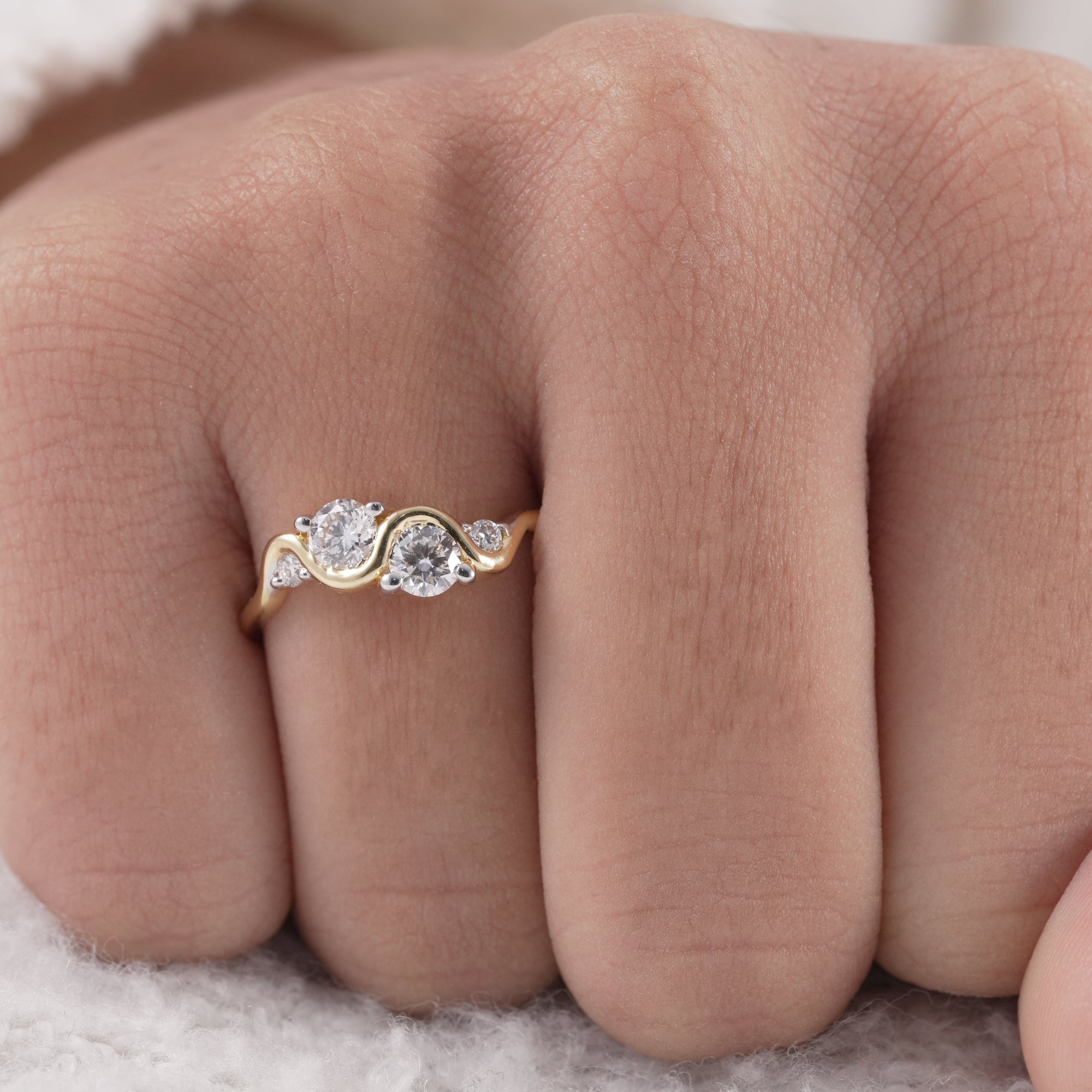 Round diamond wave band with delicate contemporary styling.