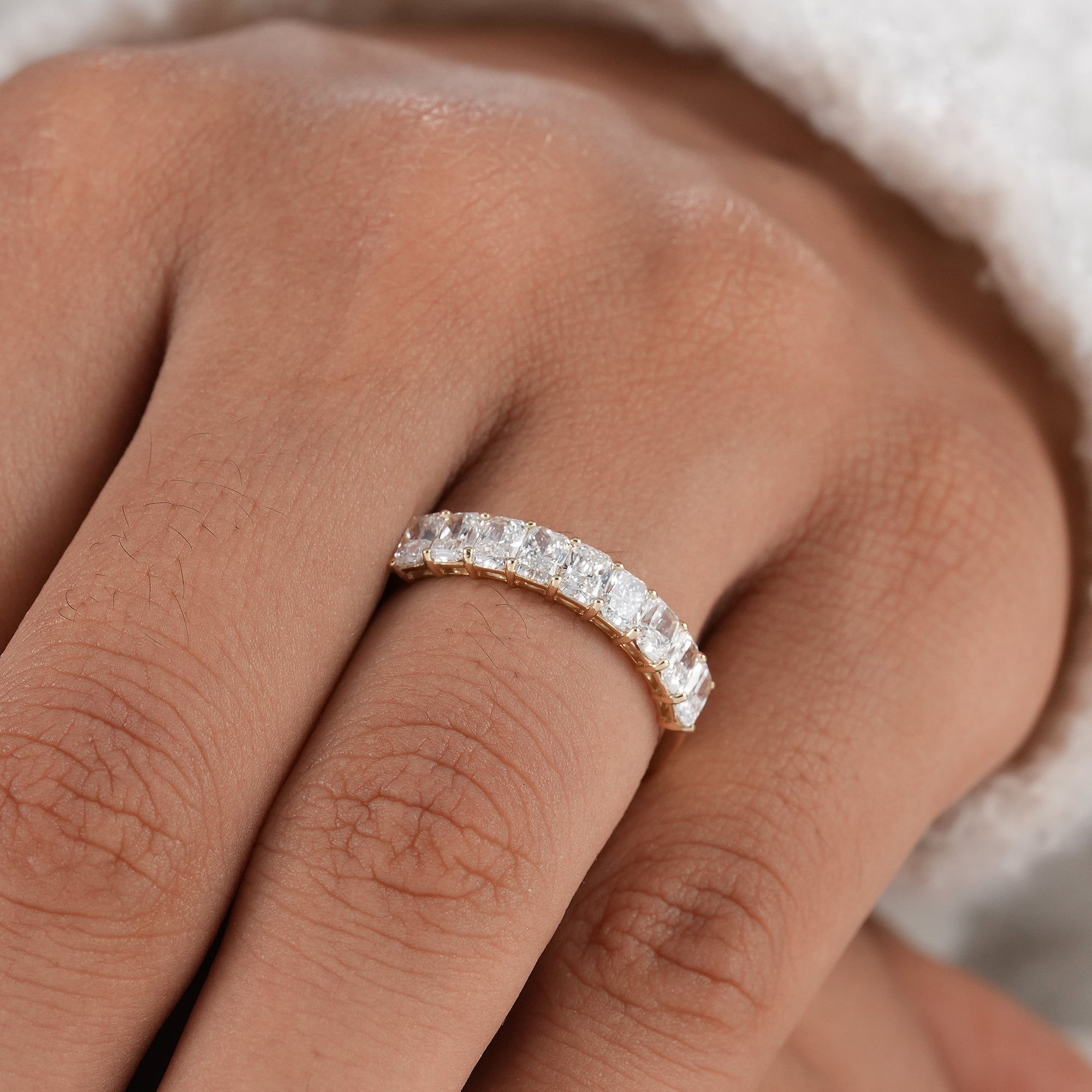 Elegant stackable radiant eternity band.