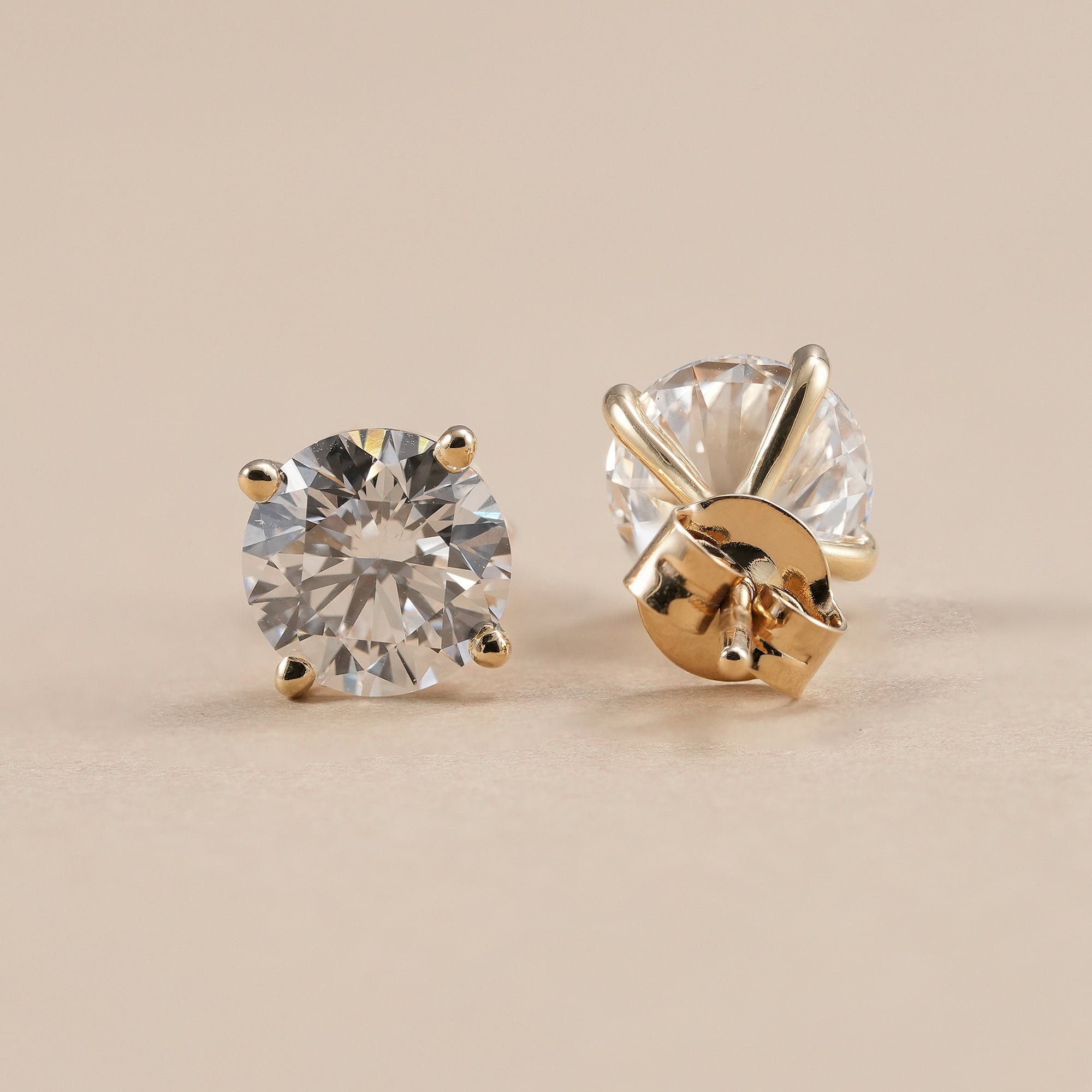 Minimalist round solitaire diamond earrings for women in solid gold