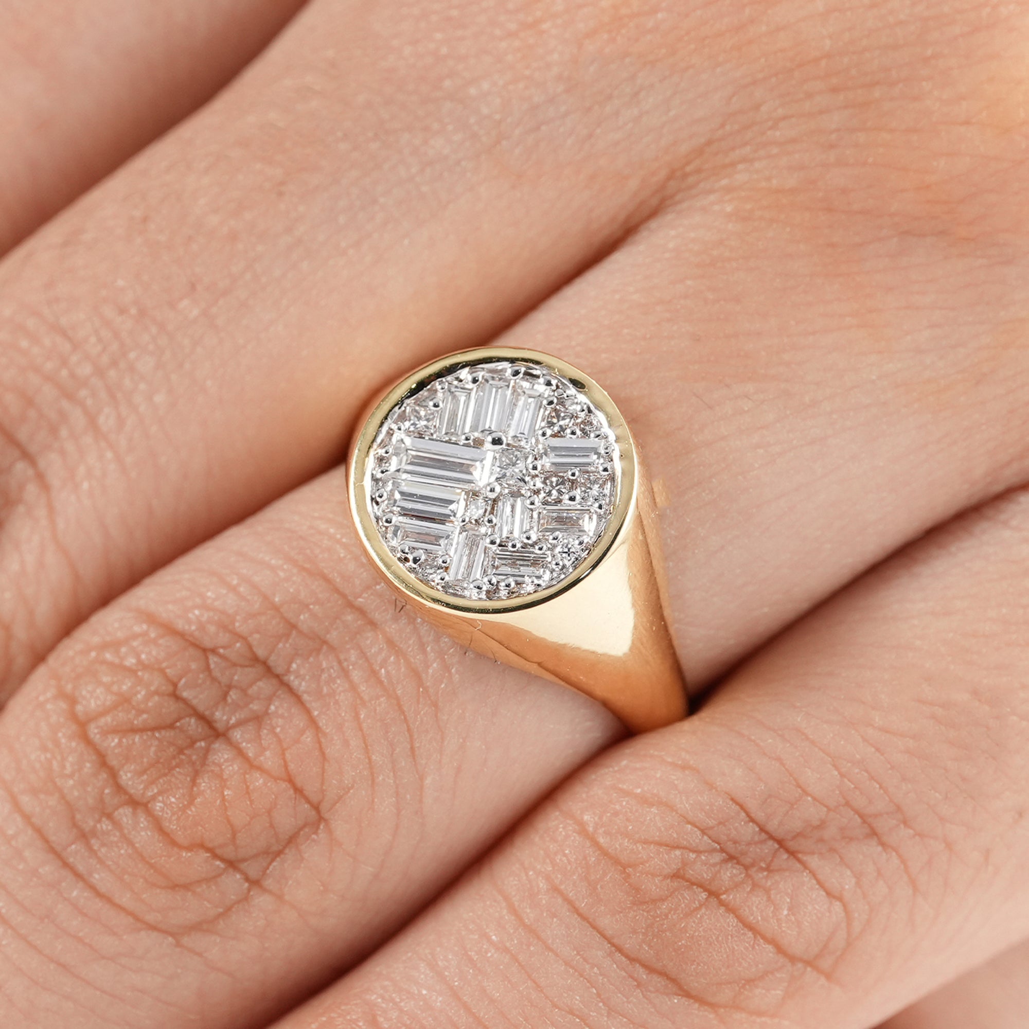Art Deco inspired gold signet ring with baguette and princess diamonds