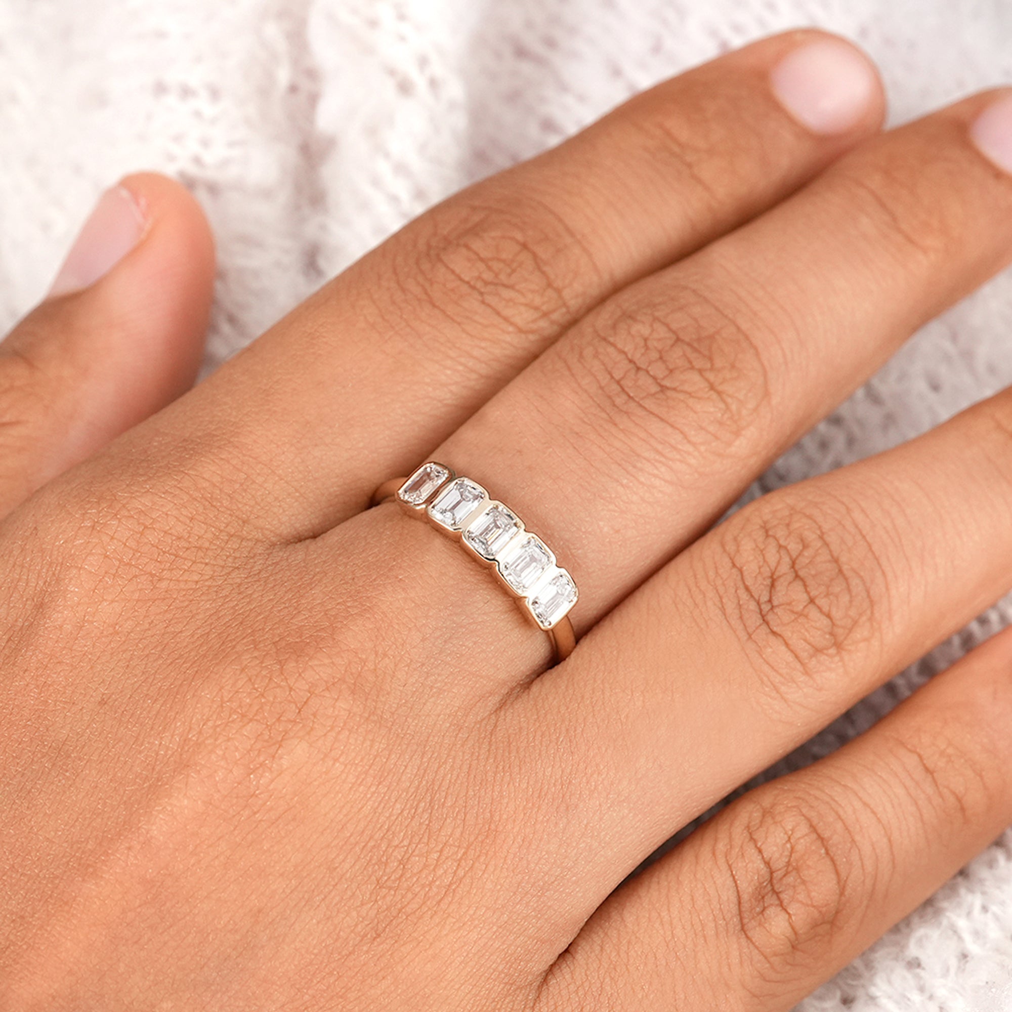 Fine jewelry emerald cut diamond ring with five stones