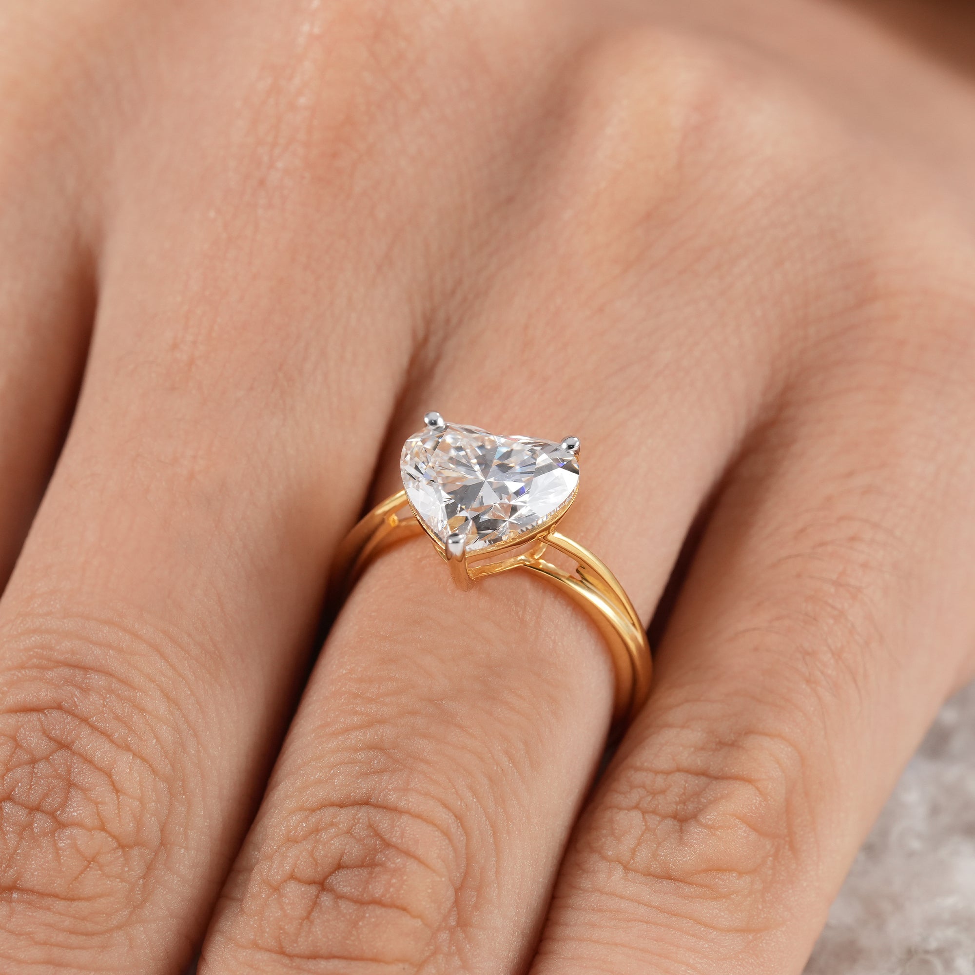 Romantic heart shaped lab diamond engagement ring.