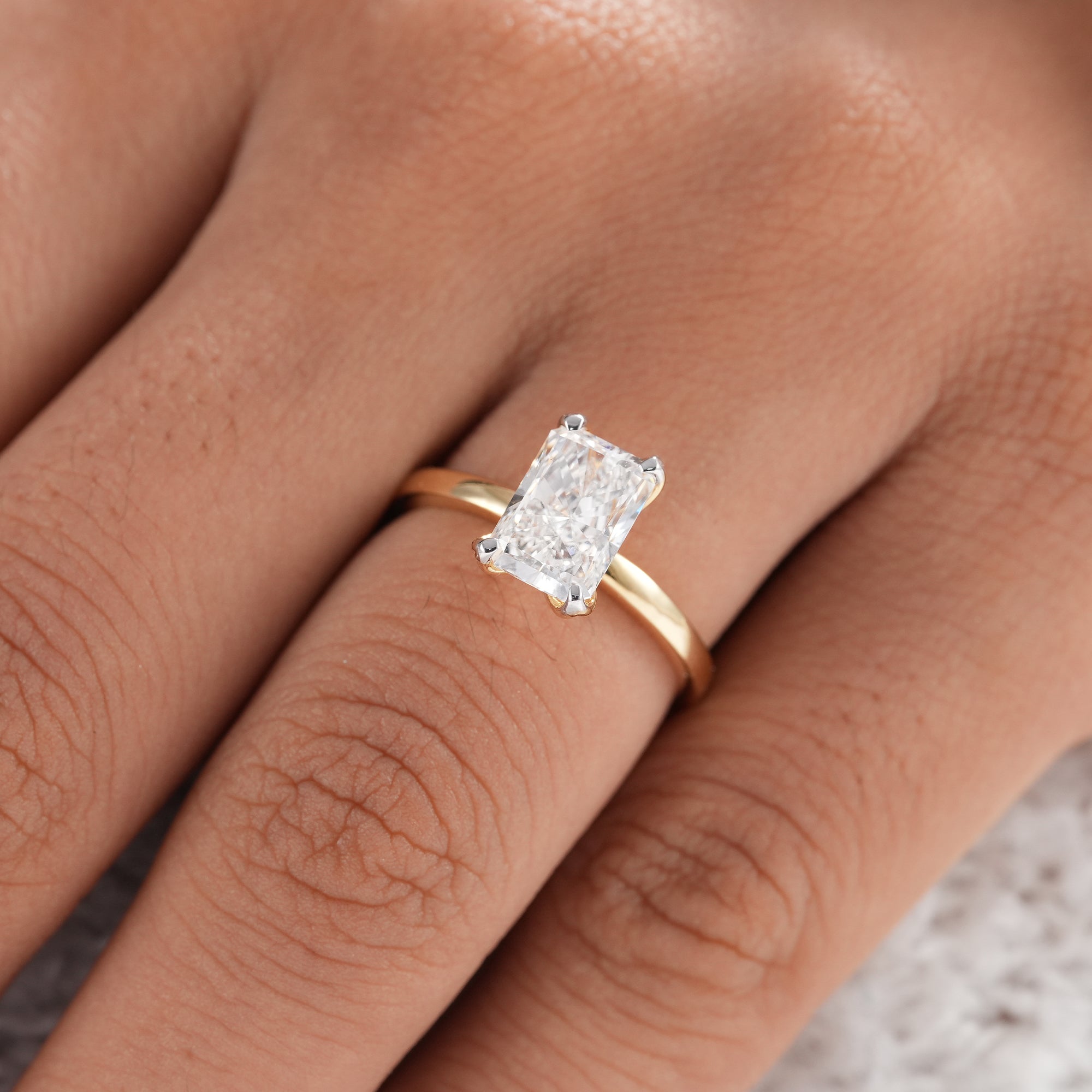 Modern radiant cut lab diamond ring for anniversary gift.