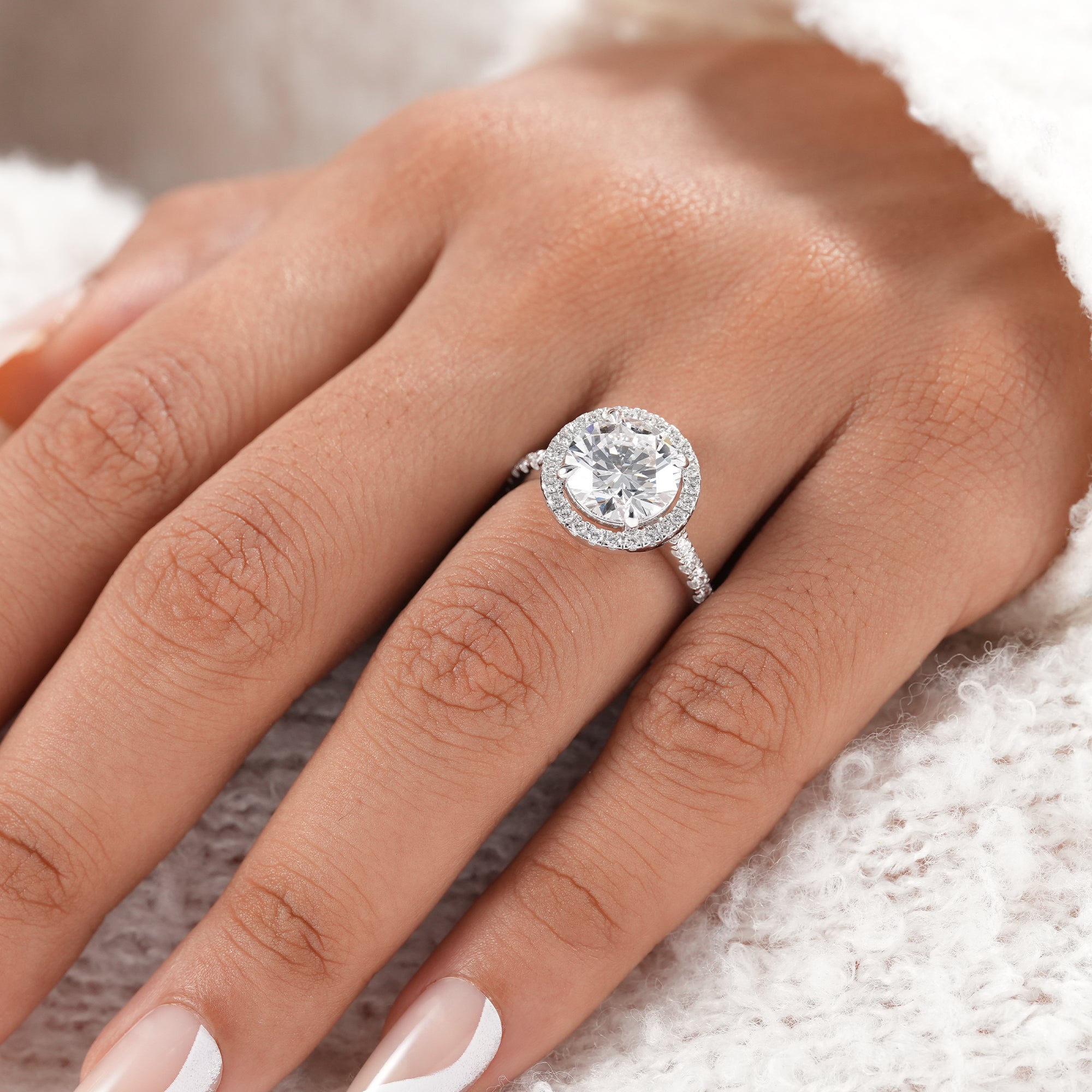 Ethical IGI certified round lab diamond engagement ring.