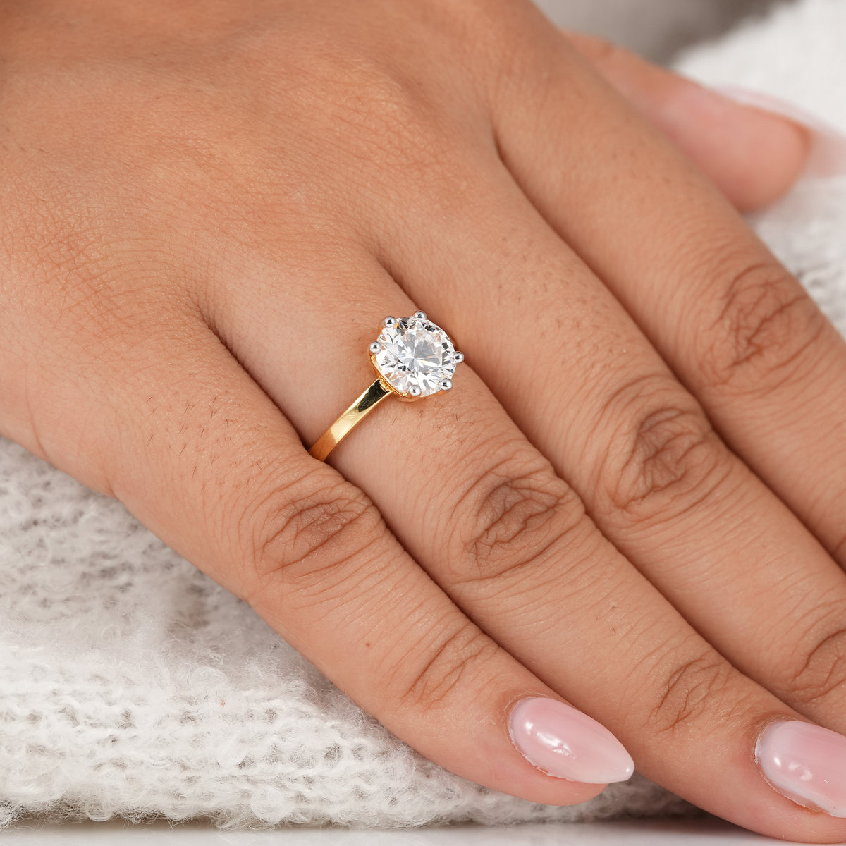 Sustainable lab grown round diamond ring handcrafted for proposals and weddings.