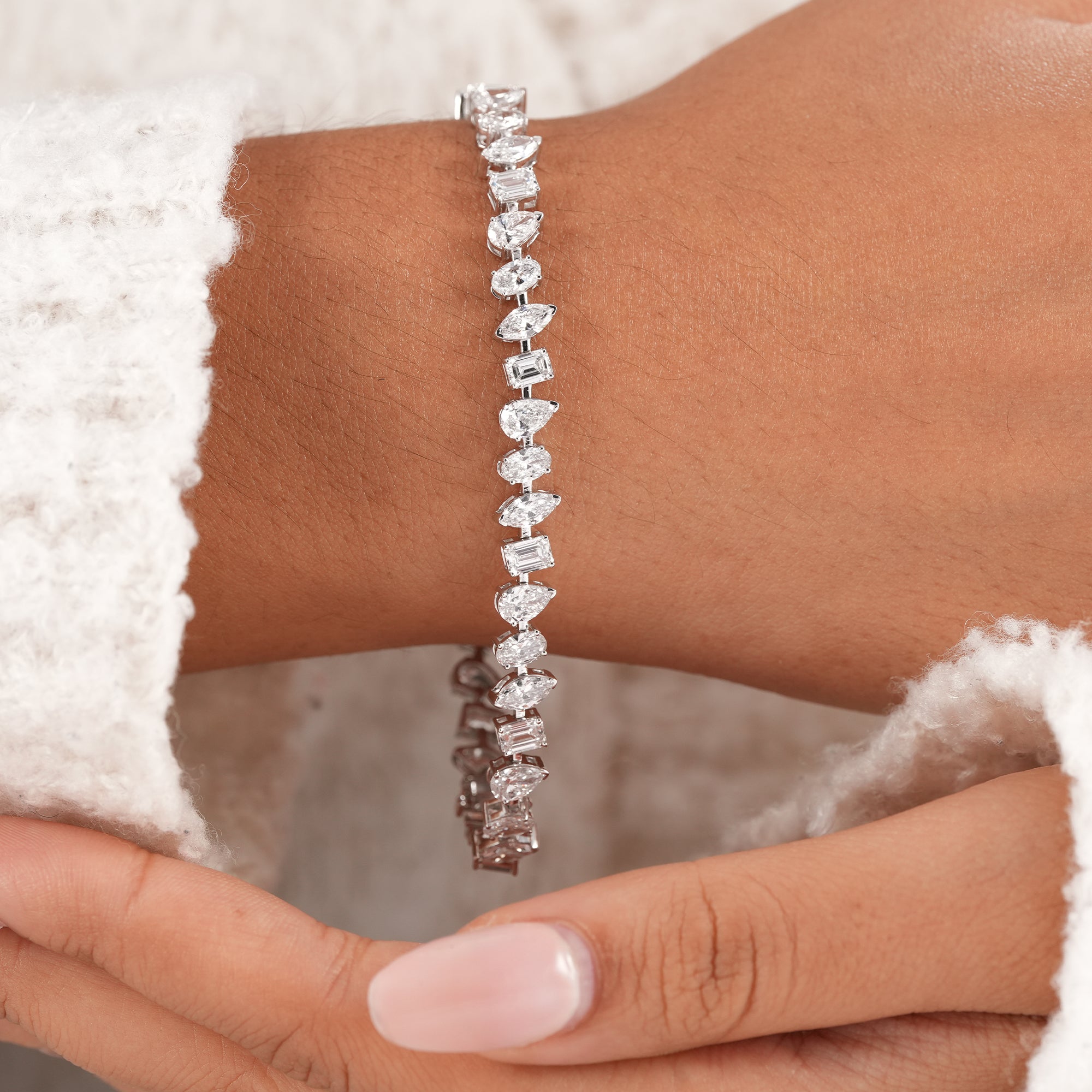 Women's mixed shape tennis bracelet featuring brilliant lab diamonds.