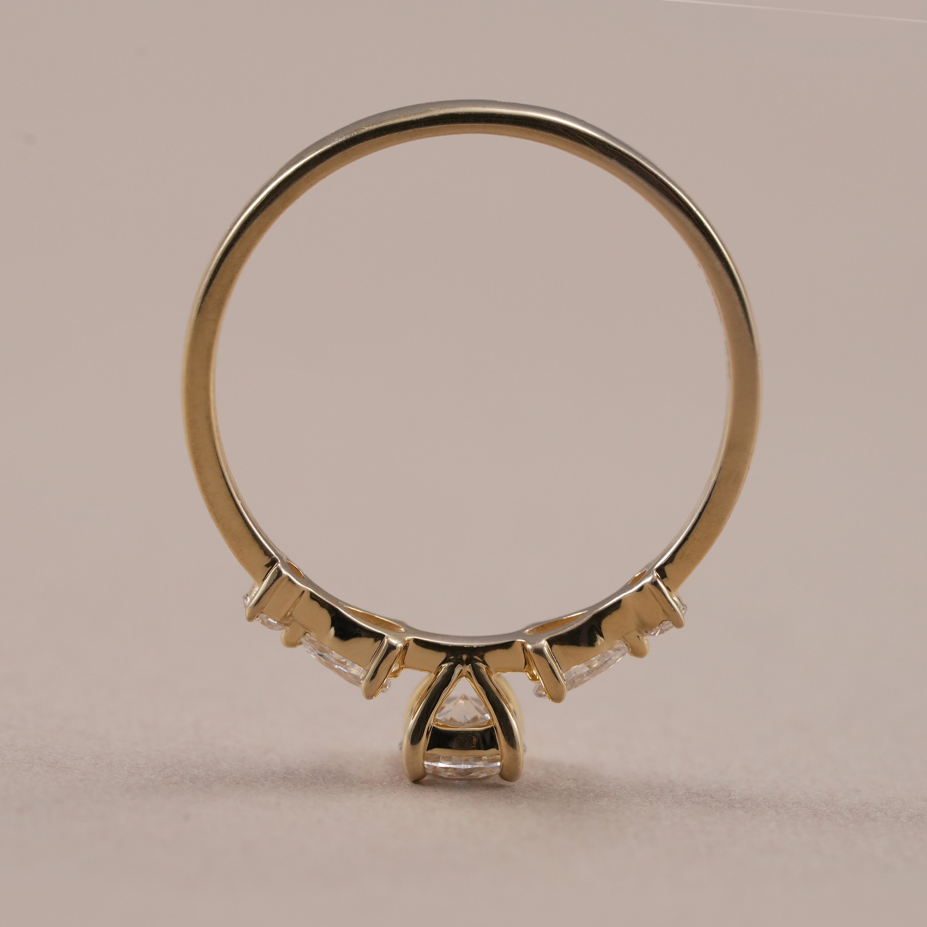 Sustainable lab diamond ring with pear side stones