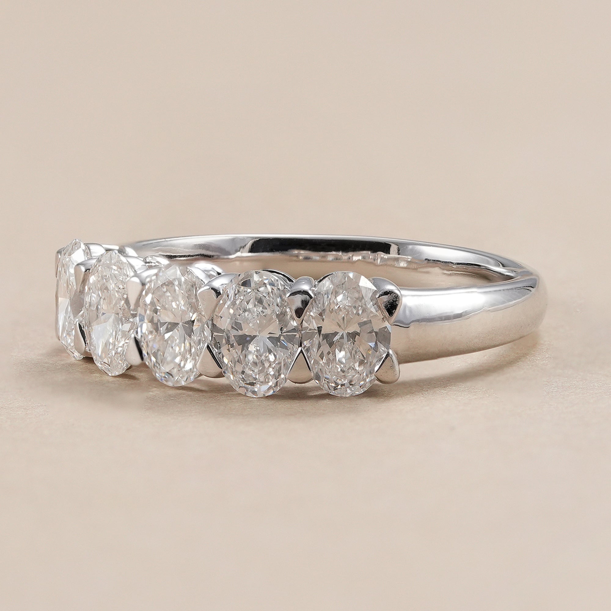 Five stone oval lab grown diamond stackable wedding band.