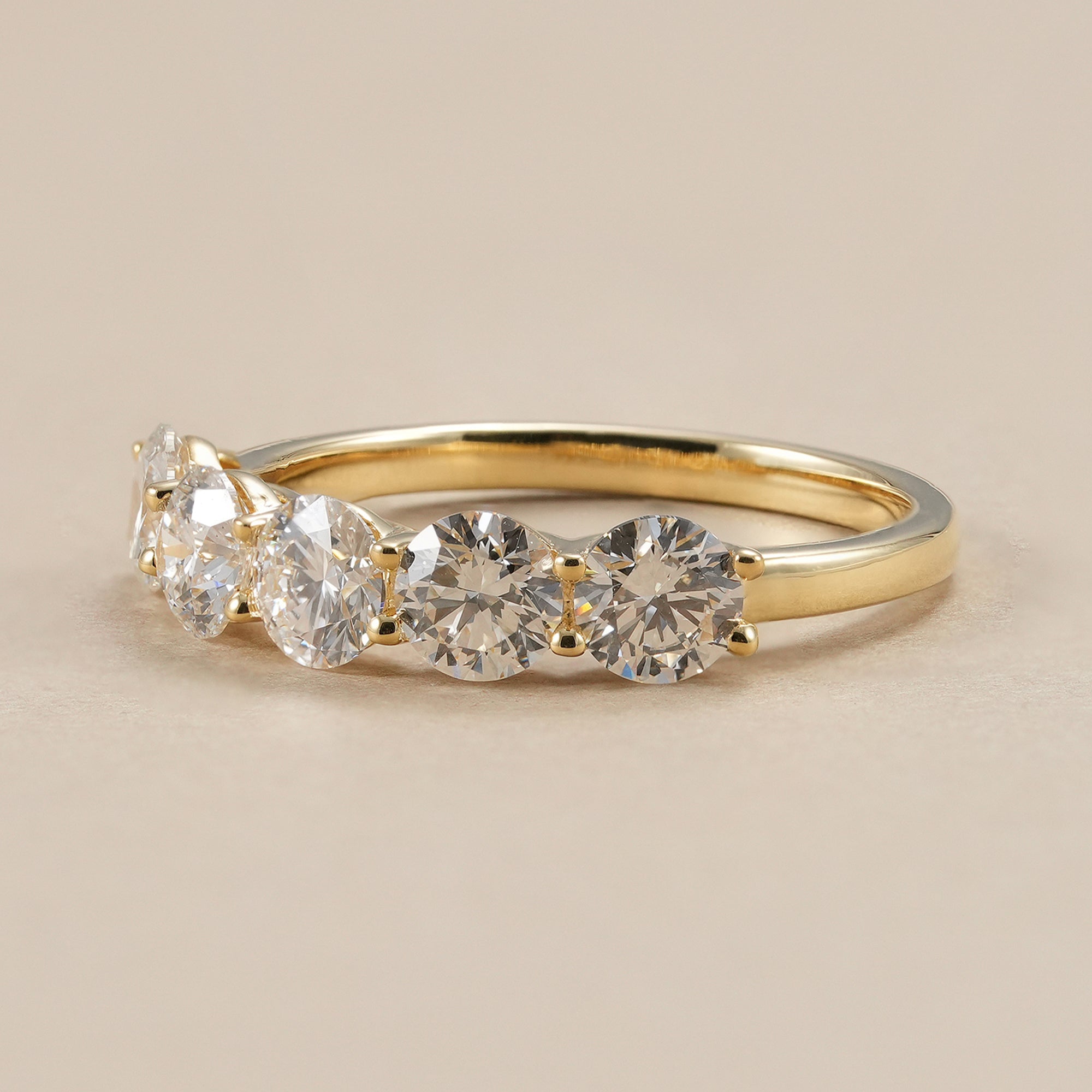 Five stone round lab diamond wedding band for women.