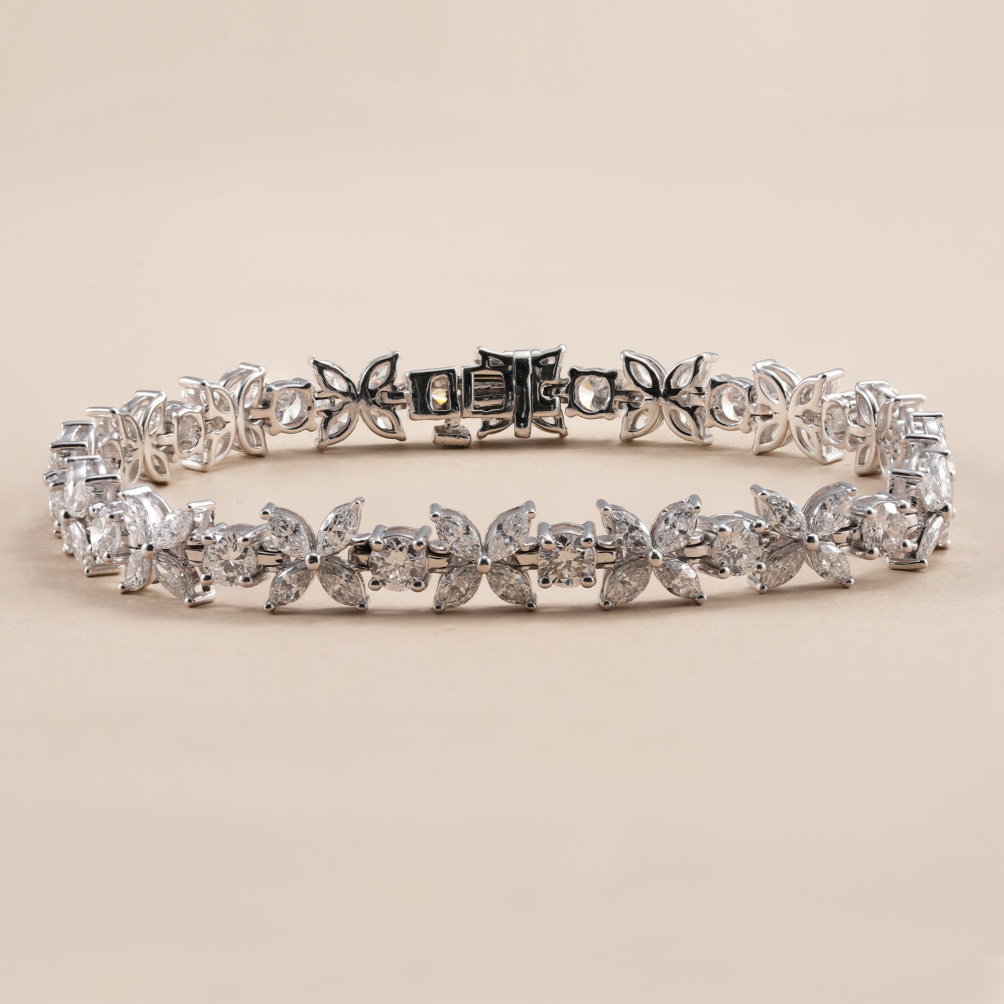 Floral inspired lab grown diamond tennis bracelet with marquise and round diamonds.