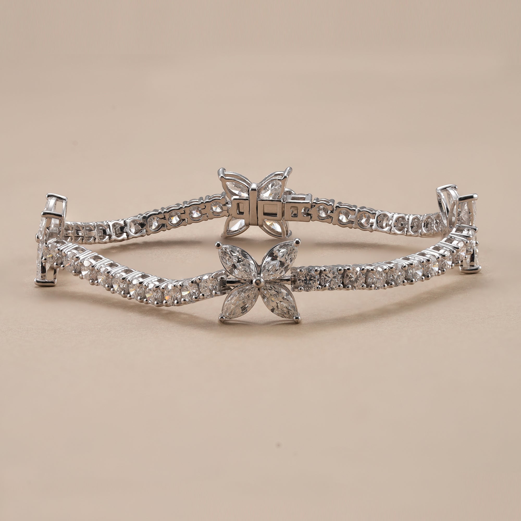 Elegant butterfly diamond tennis bracelet with marquise diamonds.