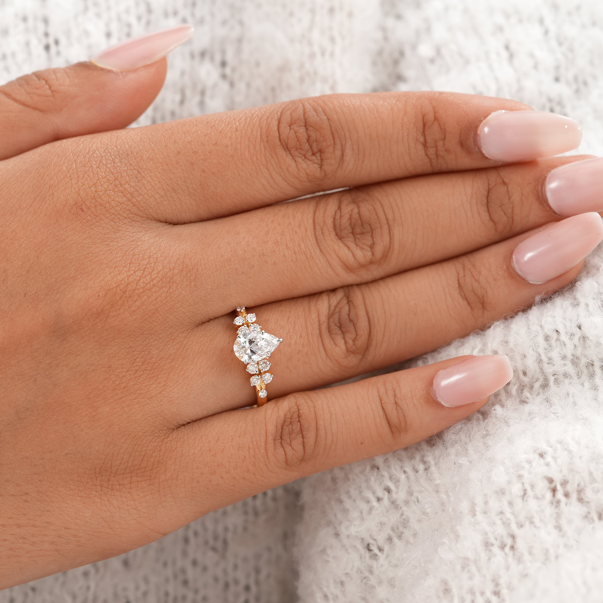 Ethical pear lab grown diamond engagement ring