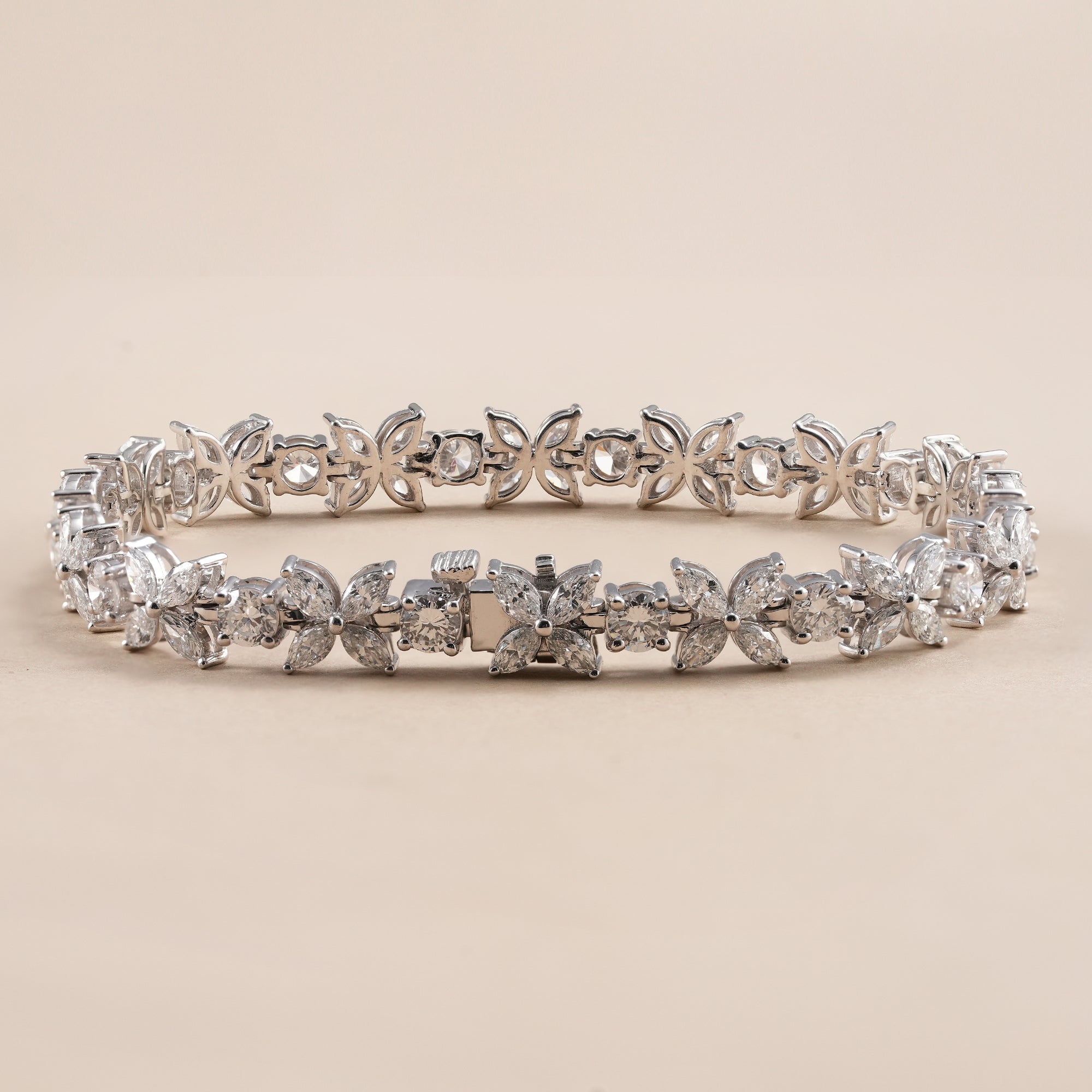 Elegant bridal bracelet featuring floral lab grown diamonds.