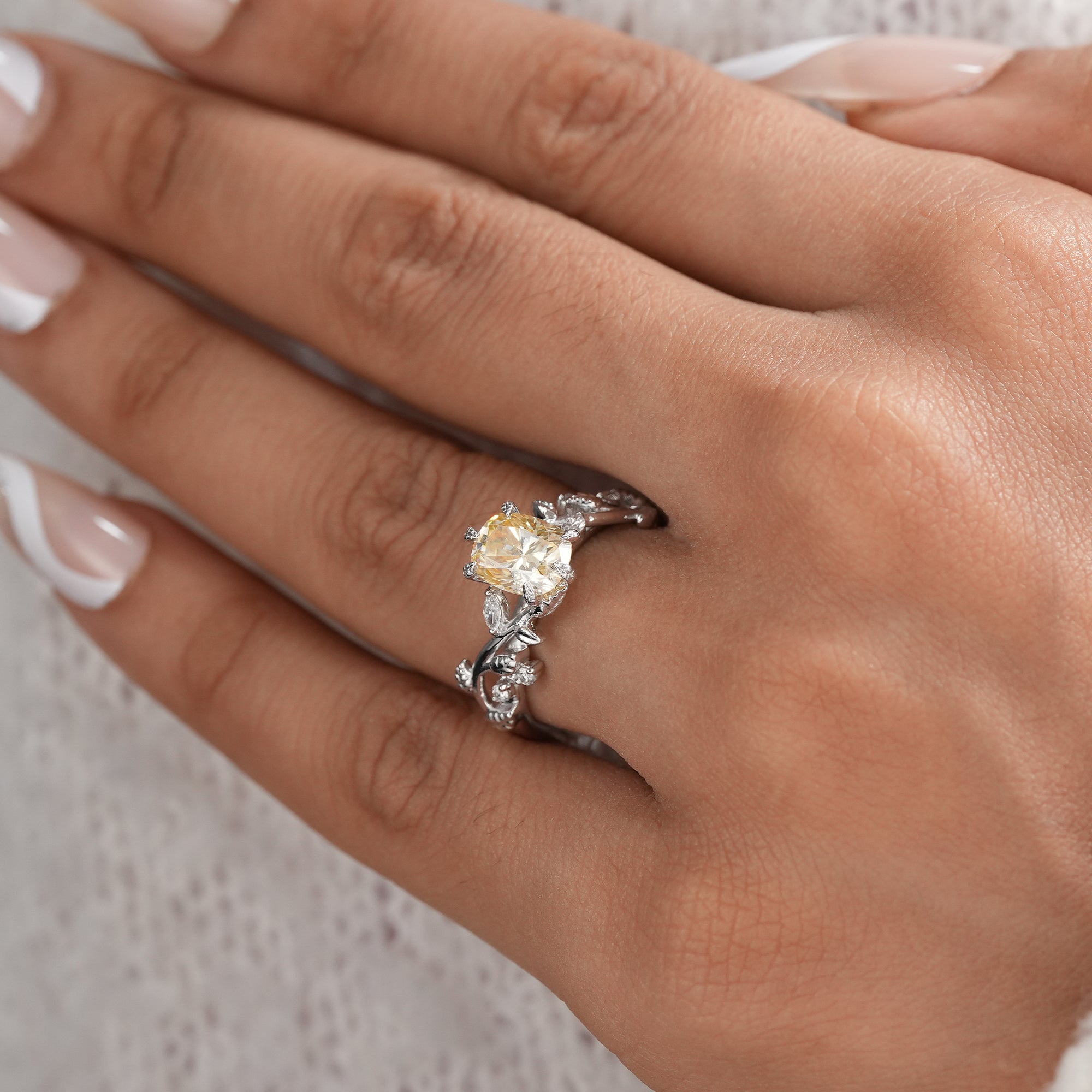 Vintage style yellow cushion diamond engagement ring.