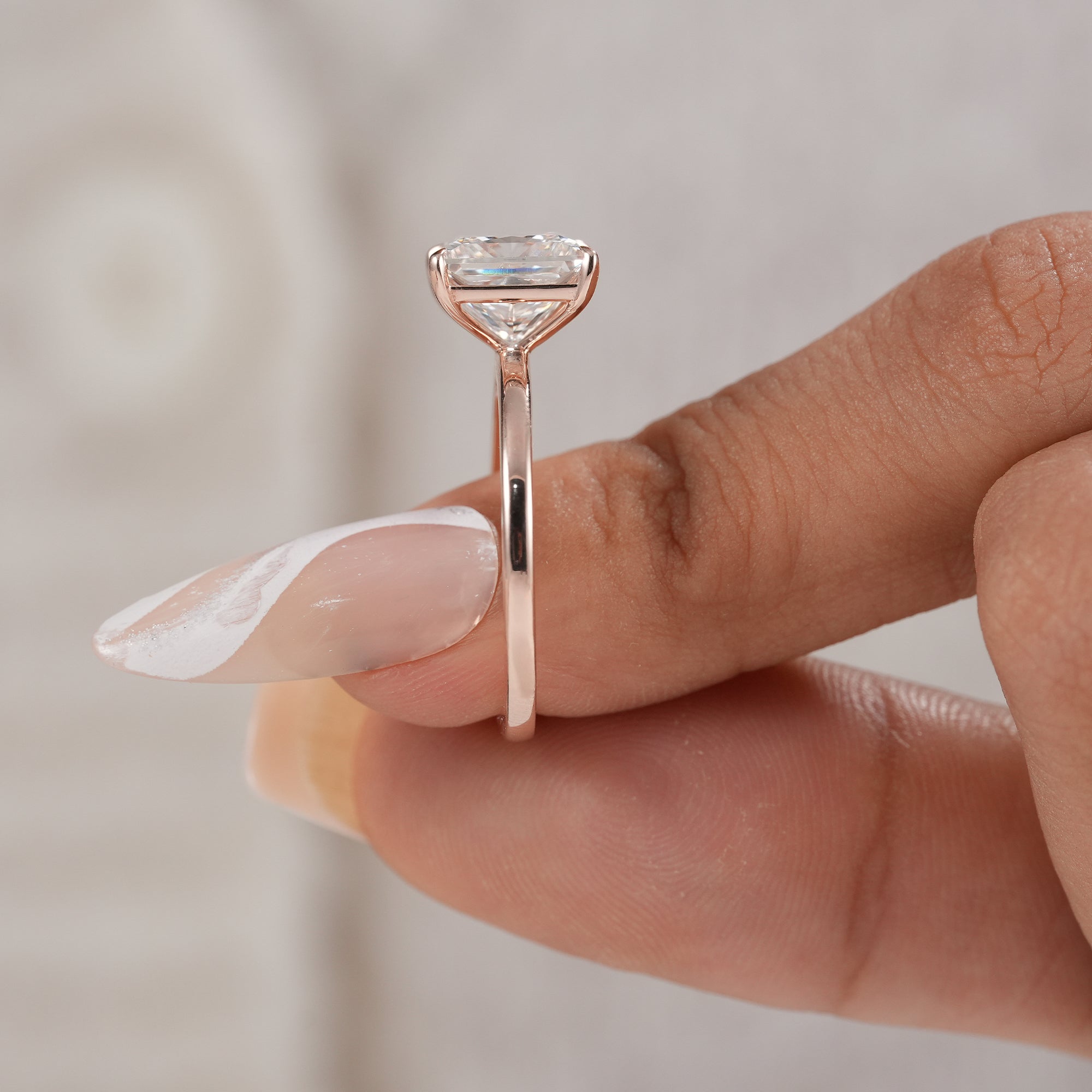Minimalist princess diamond ring with brilliant sparkle.