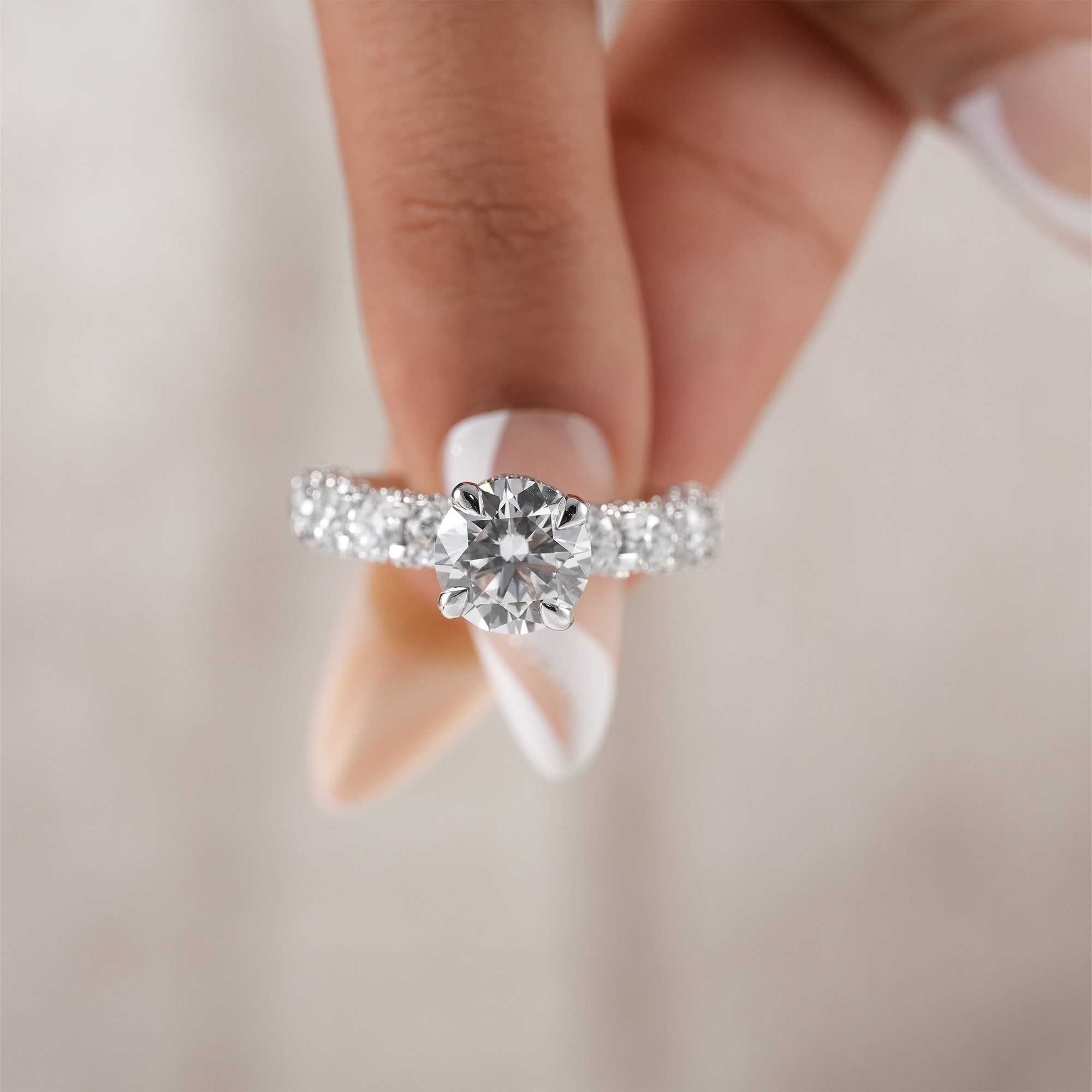 Elegant round lab diamond ring for proposals and weddings.
