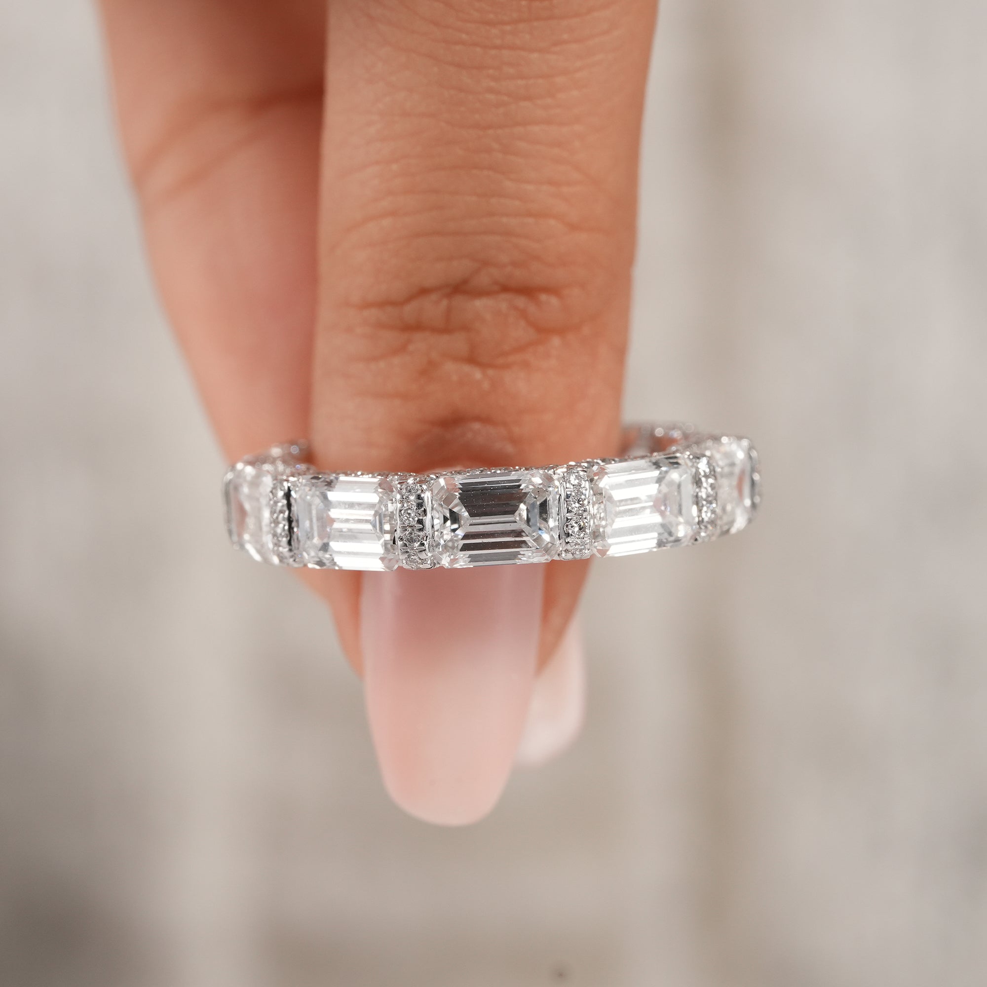 Lab grown emerald diamond eternity band for women.