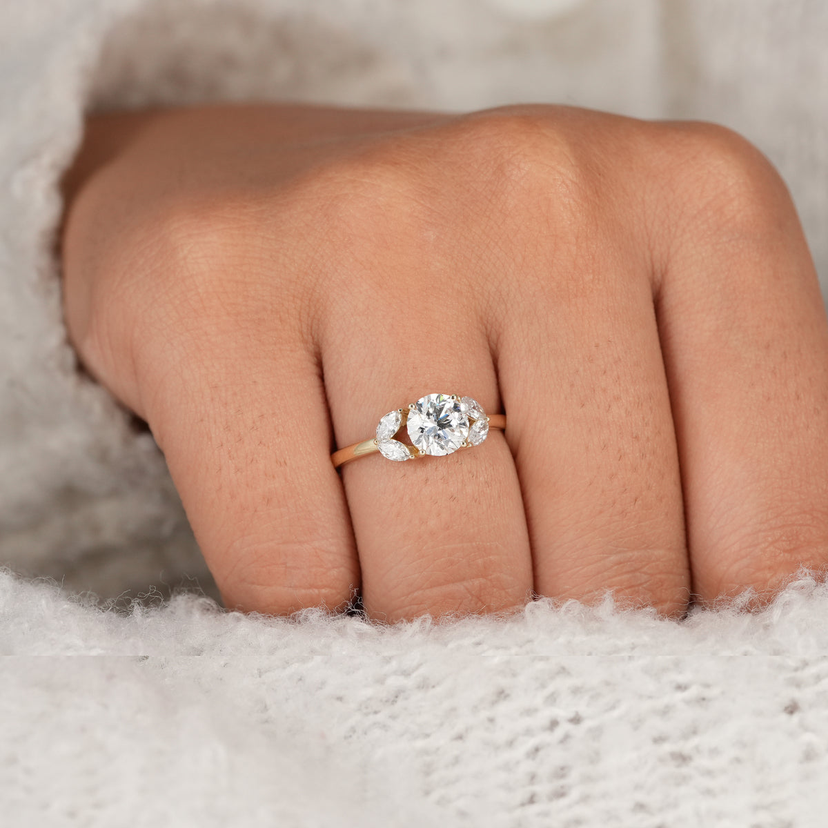 Classic floral inspired engagement ring with brilliant round lab grown diamond.