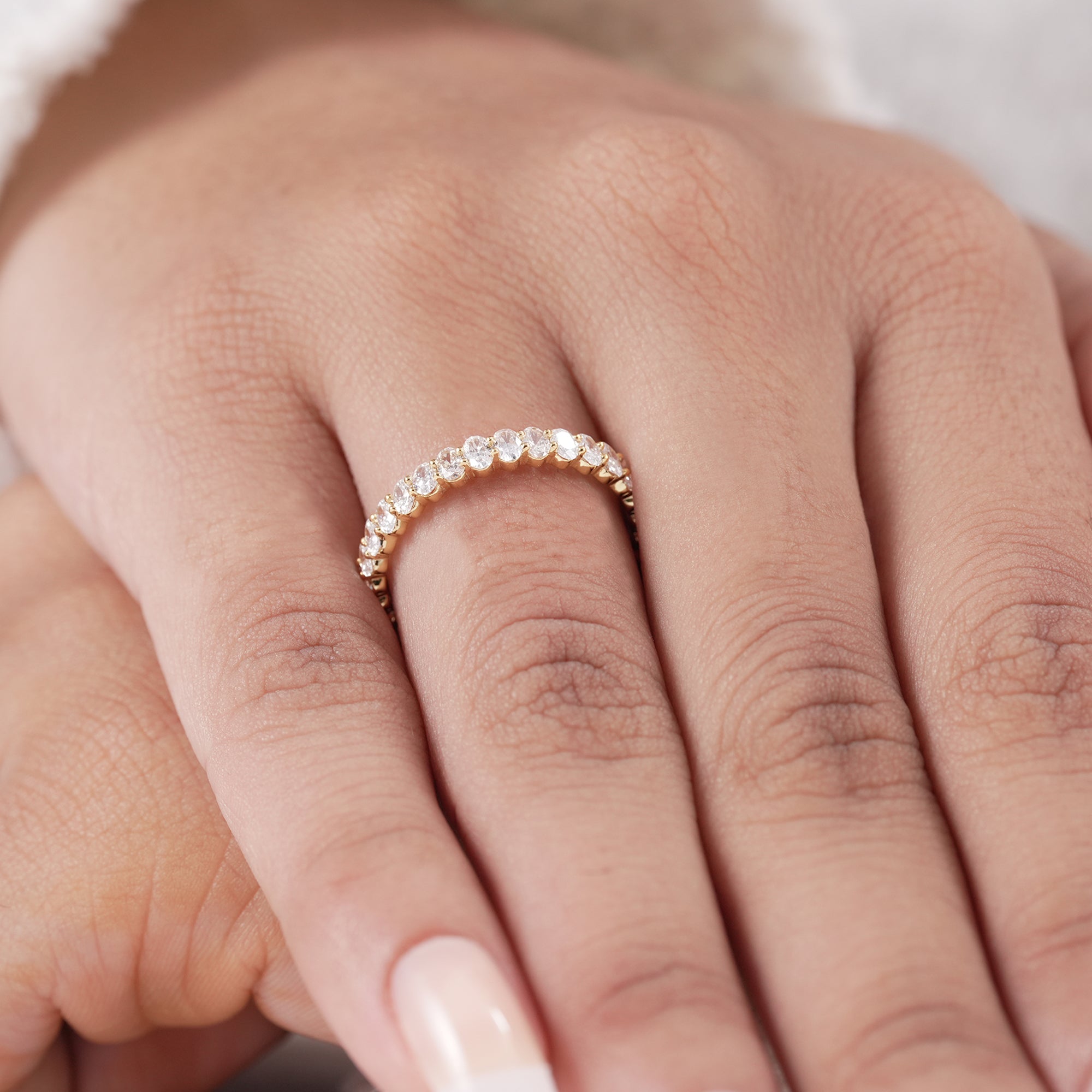 Oval lab diamond eternity band for anniversary gift.